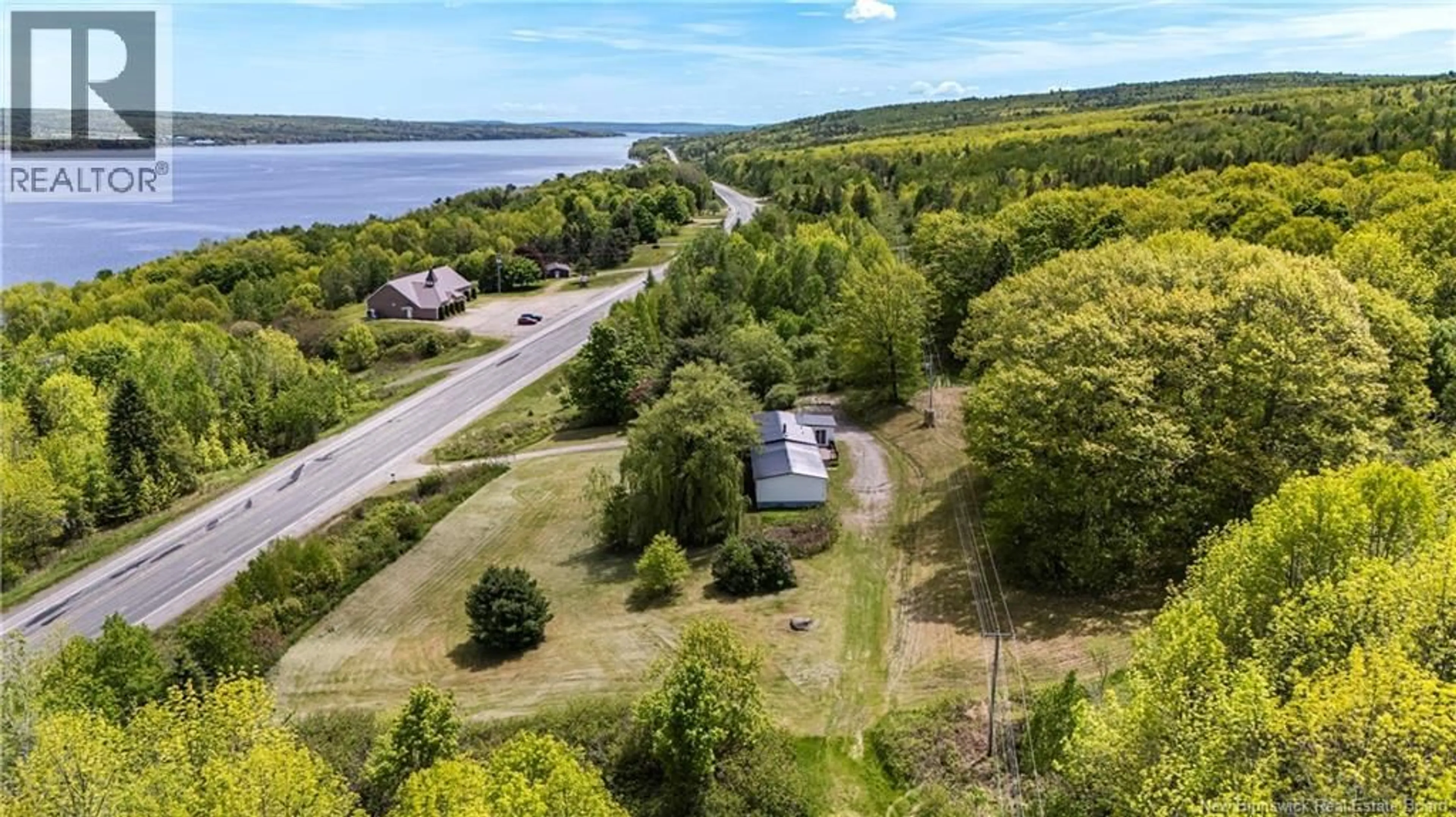 A pic from outside/outdoor area/front of a property/back of a property/a pic from drone, water/lake/river/ocean view for 6860 ROUTE 102, Dumfries New Brunswick E6G1P3