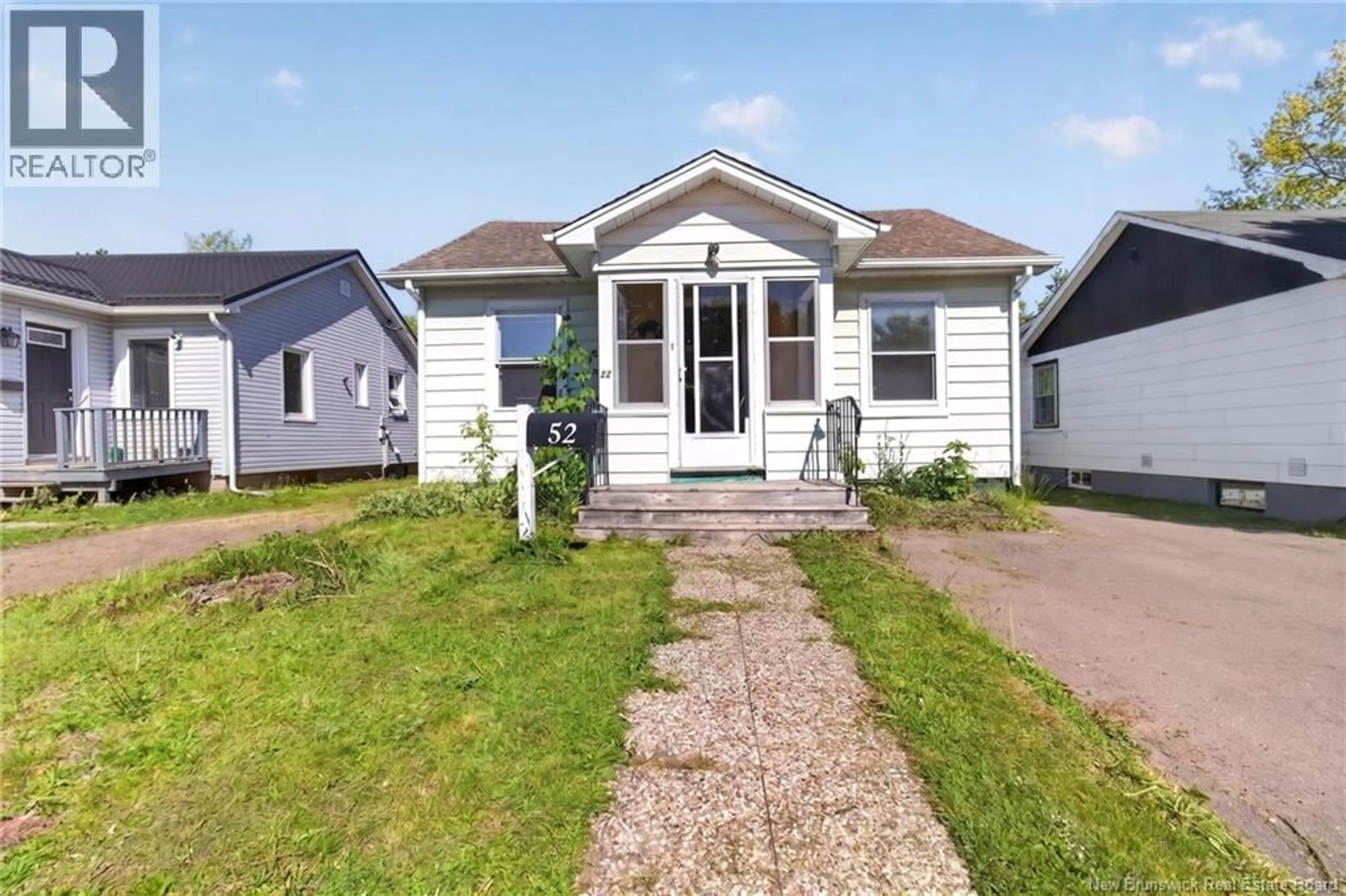 Home with vinyl exterior material, street for 52 AIRPORT STREET, Dieppe New Brunswick E1A2G4