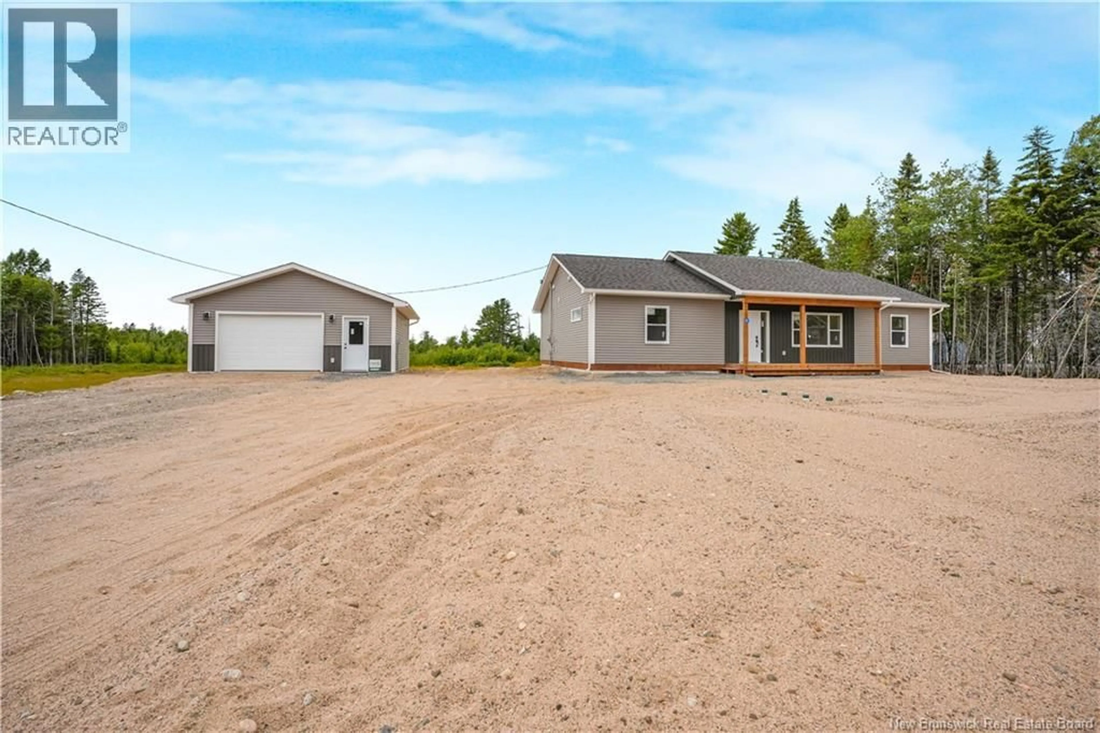 A pic from outside/outdoor area/front of a property/back of a property/a pic from drone, building for 31 SANDLEWOOD LANE, Douglas New Brunswick E3G0E7