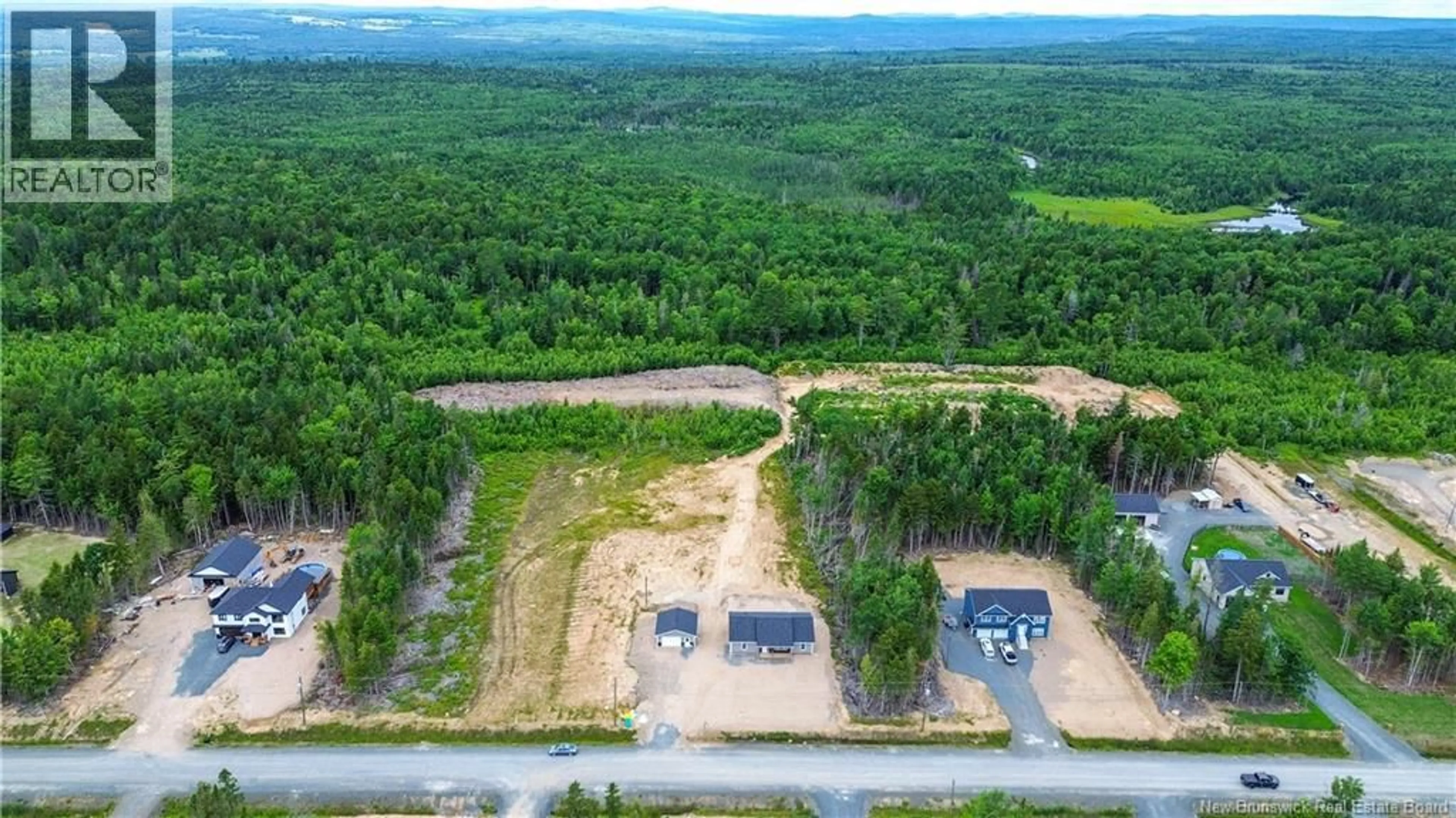 A pic from outside/outdoor area/front of a property/back of a property/a pic from drone, forest/trees view for 31 SANDLEWOOD LANE, Douglas New Brunswick E3G0E7