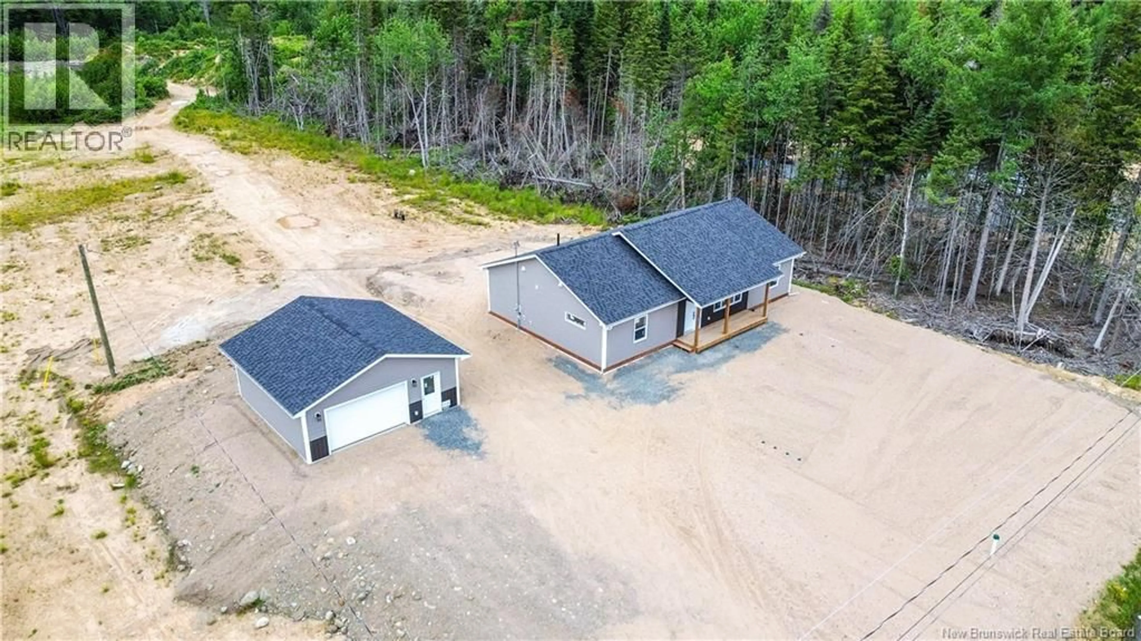A pic from outside/outdoor area/front of a property/back of a property/a pic from drone, building for 31 SANDLEWOOD LANE, Douglas New Brunswick E3G0E7