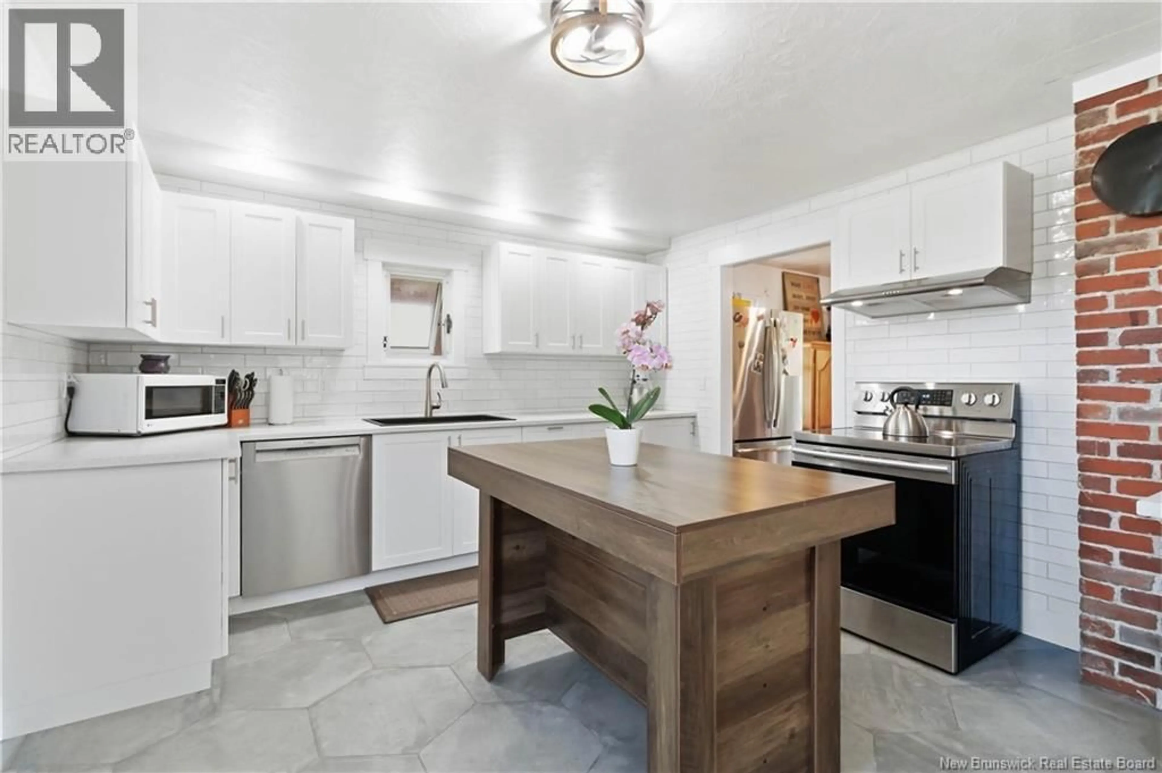 Open concept kitchen, ceramic/tile floor for 49 HAYWARD ROAD, Prosser Brook New Brunswick E4Z1W3