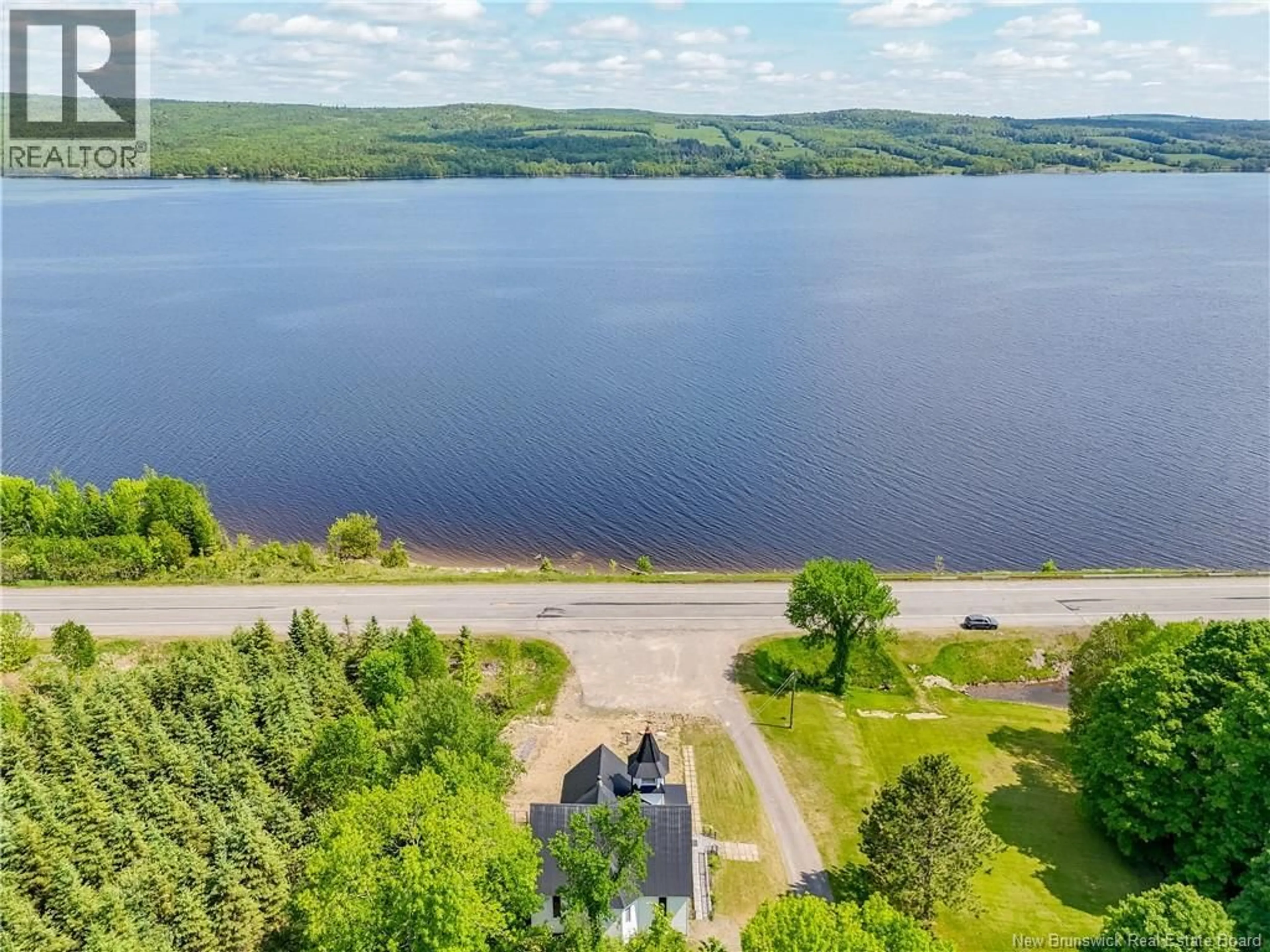 A pic from outside/outdoor area/front of a property/back of a property/a pic from drone, water/lake/river/ocean view for 6682 ROUTE 102, Nackawic New Brunswick E6K3T7