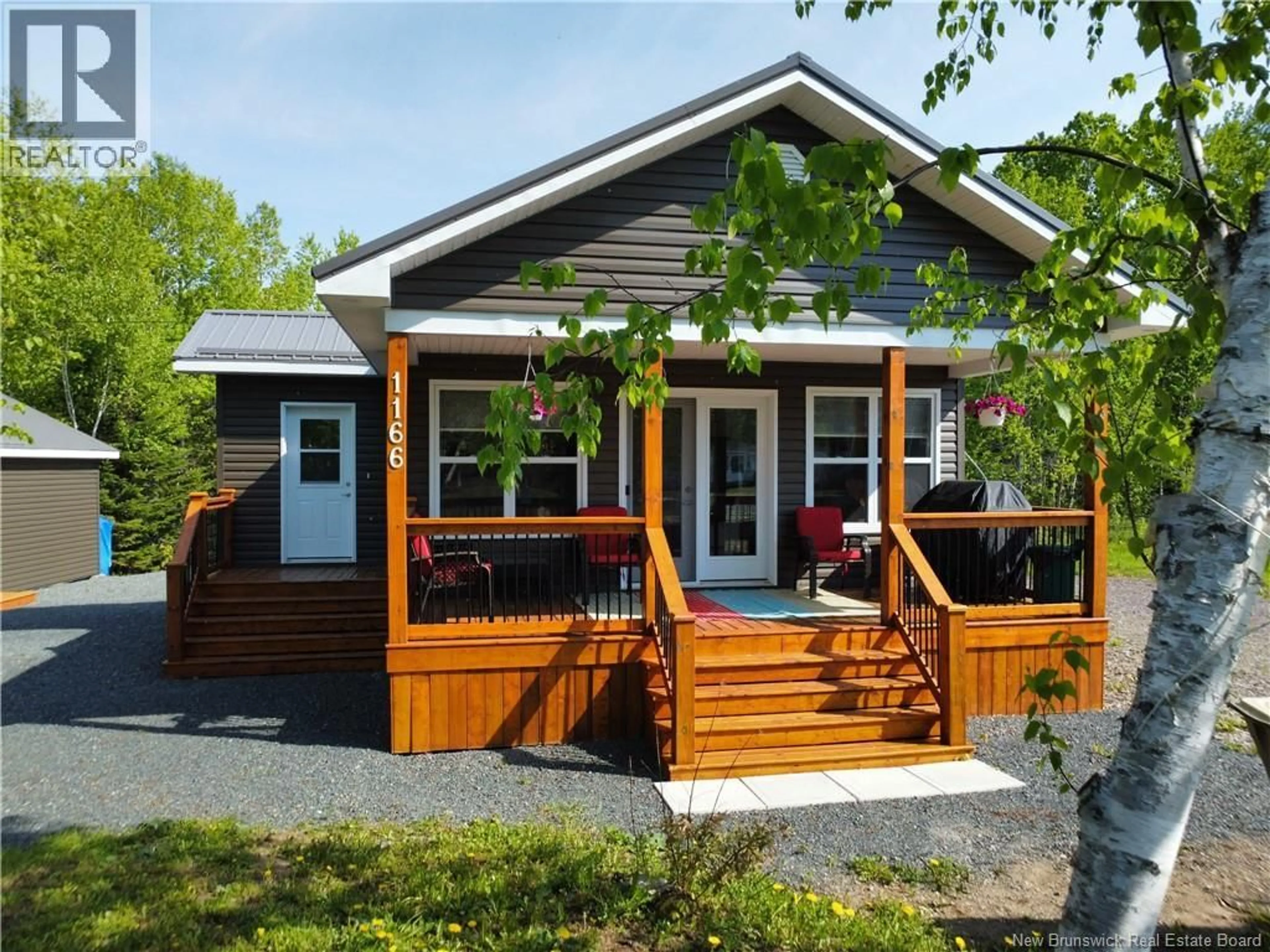 Home with vinyl exterior material, street for 1166 ROBERTVILLE ROAD, Robertville New Brunswick E8K2W1