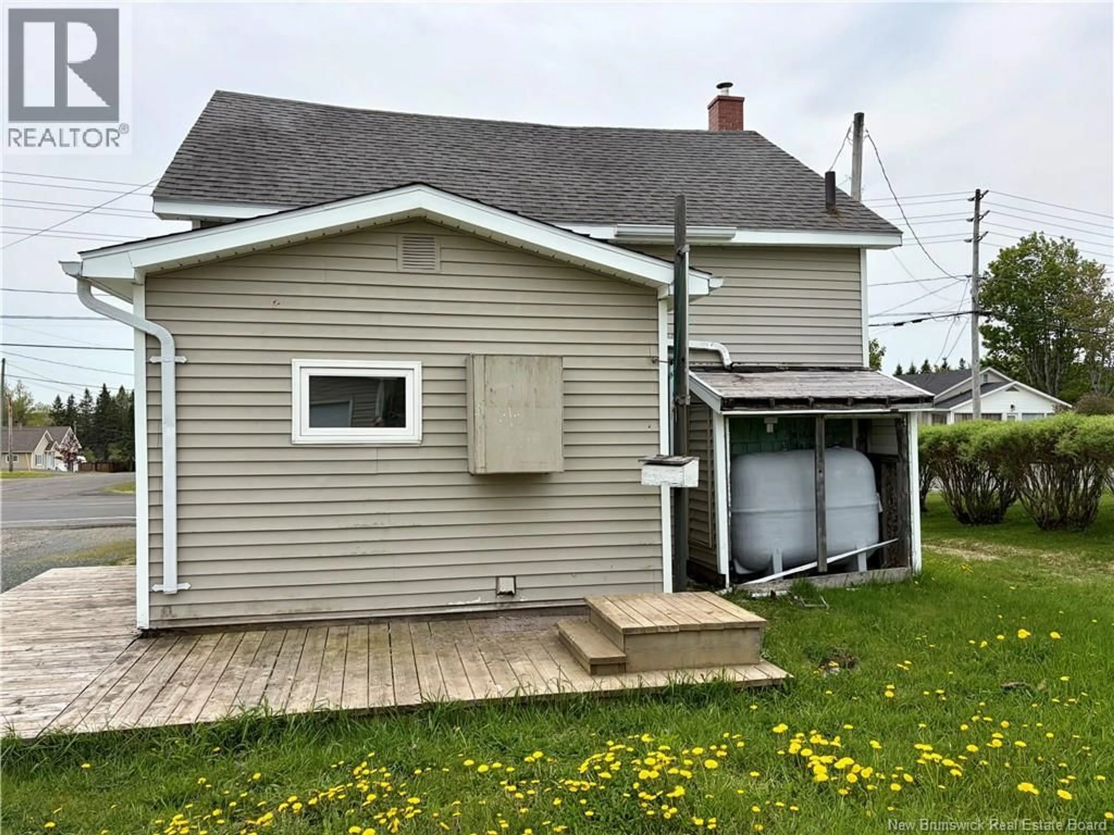 Home with vinyl exterior material, street for 18 MALLET, Eel River Crossing New Brunswick E6E1R9
