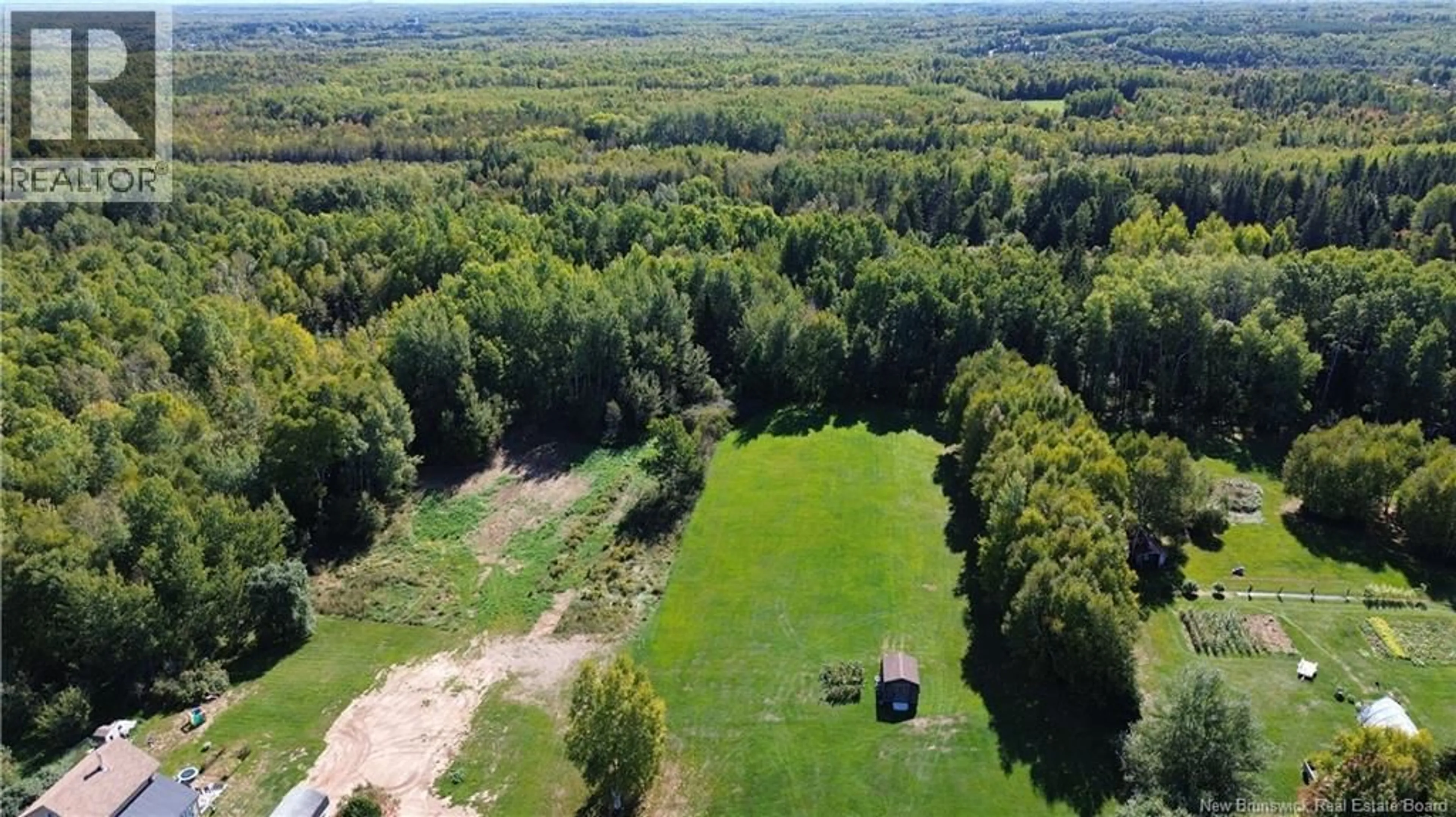 A pic from outside/outdoor area/front of a property/back of a property/a pic from drone, forest/trees view for 1781 NICHOLAS DENYS, Sainte-Rosette New Brunswick E8K3J9