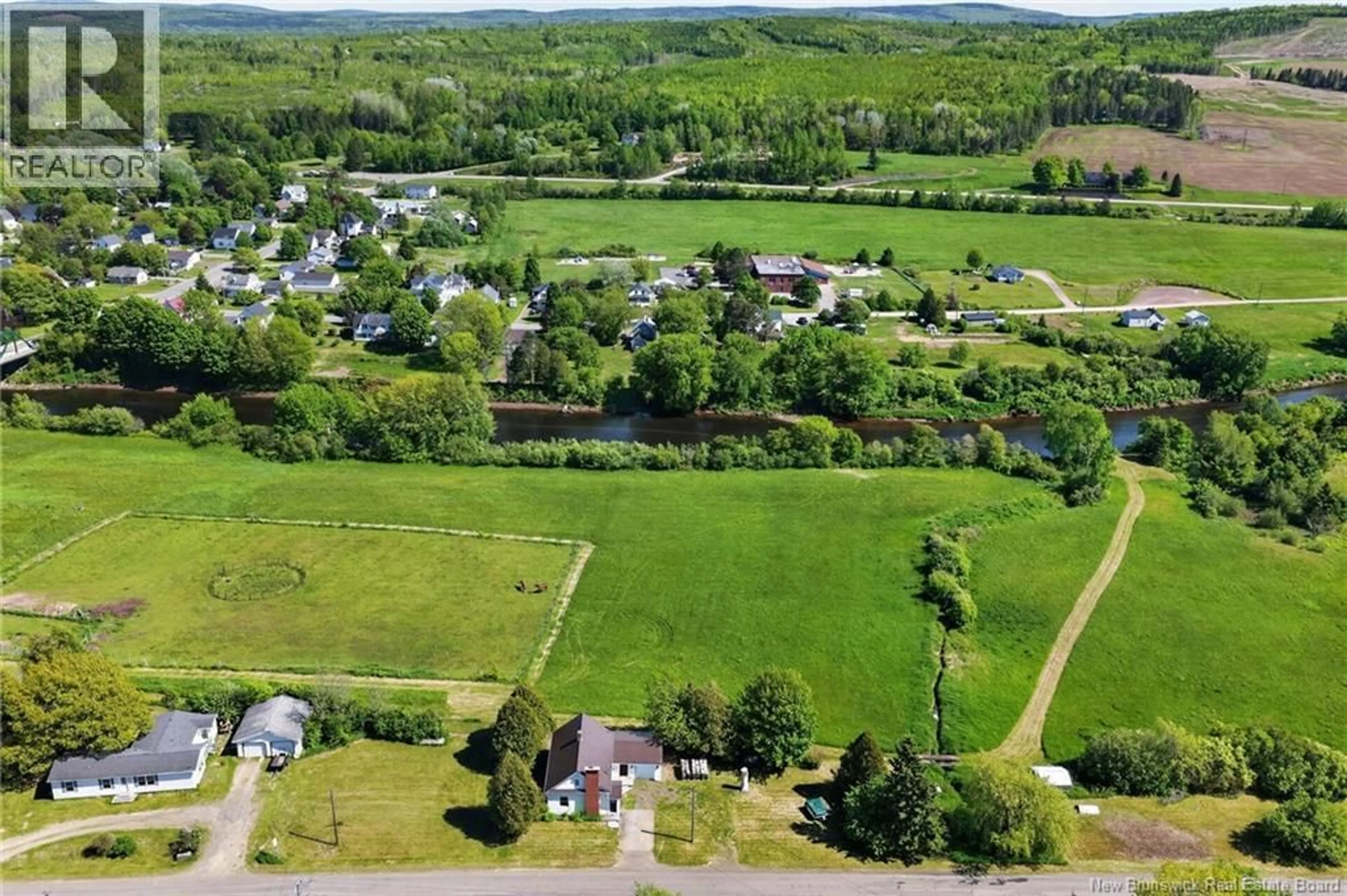A pic from outside/outdoor area/front of a property/back of a property/a pic from drone, unknown for 2964 ROUTE 121, Apohaqui New Brunswick E5P3X1