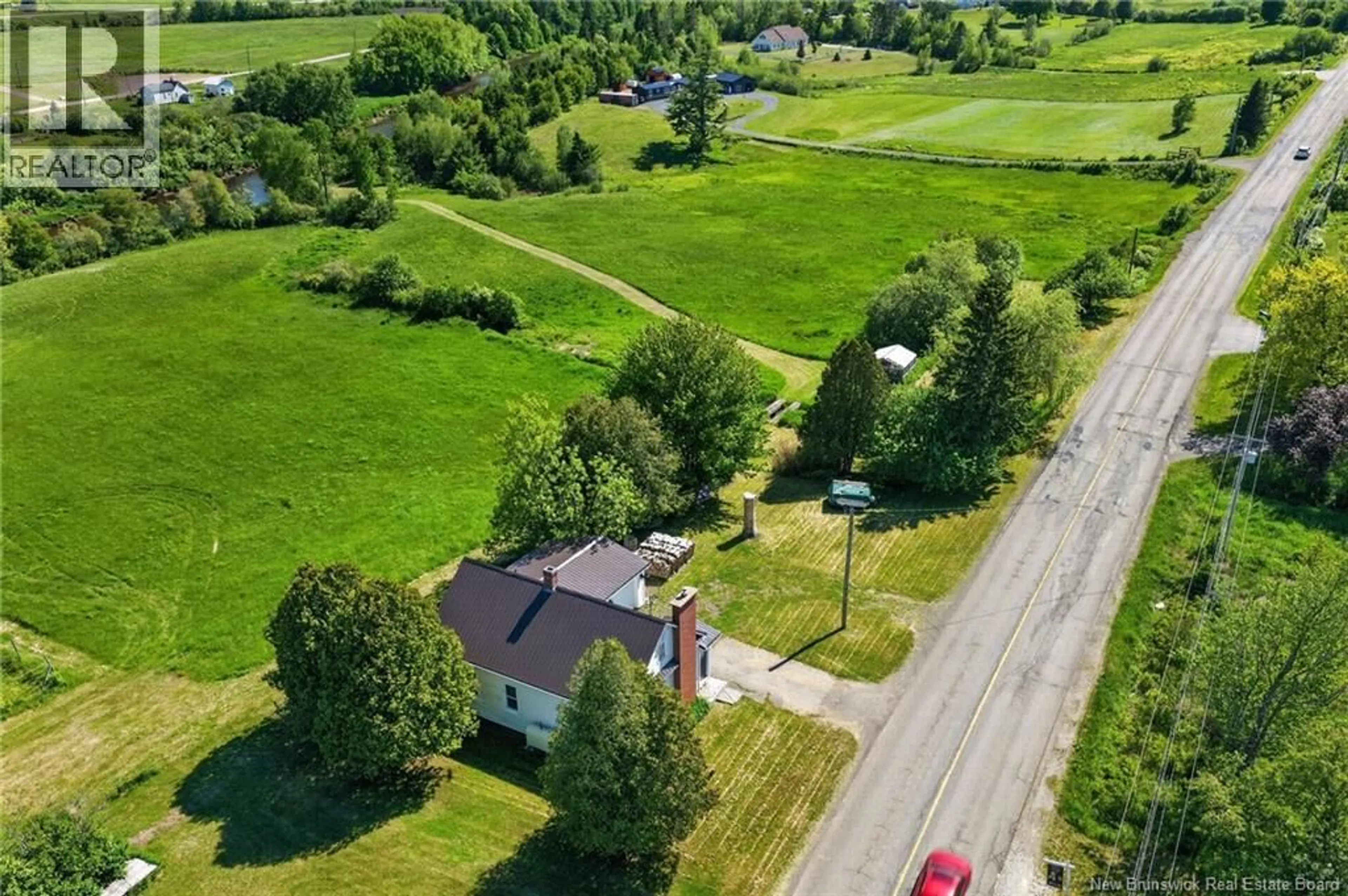 A pic from outside/outdoor area/front of a property/back of a property/a pic from drone, street for 2964 ROUTE 121, Apohaqui New Brunswick E5P3X1
