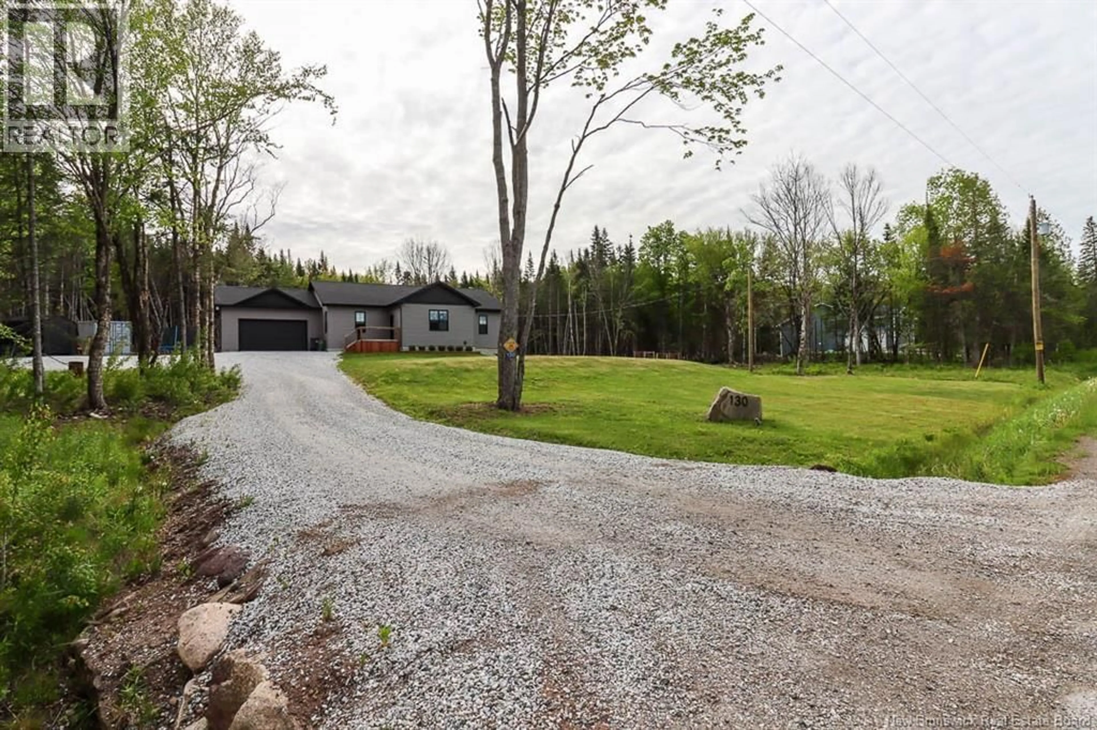 A pic from outside/outdoor area/front of a property/back of a property/a pic from drone, street for 130 LAKE ROAD ROAD, Titusville New Brunswick E5N0M7