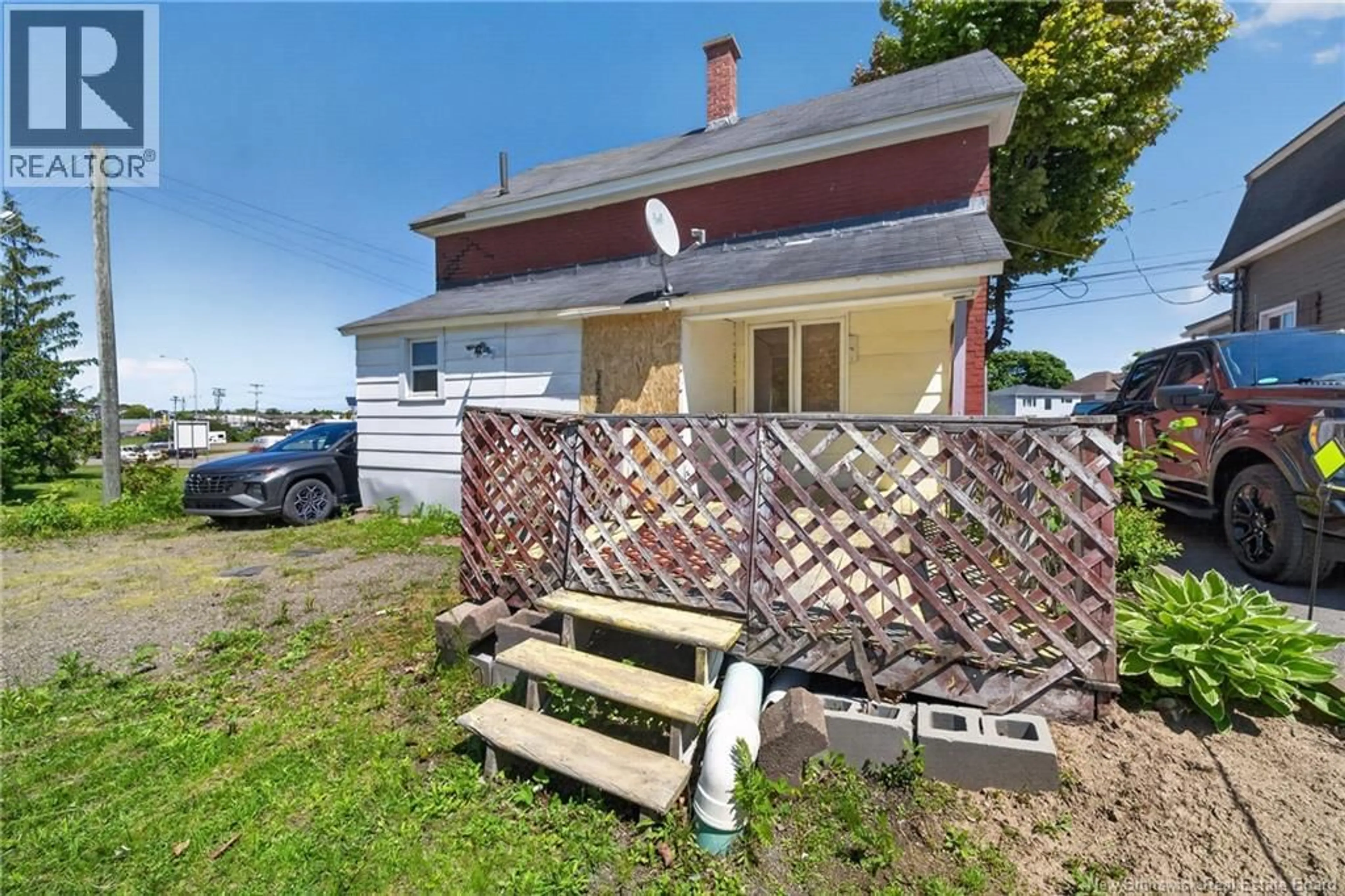A pic from outside/outdoor area/front of a property/back of a property/a pic from drone, street for 292 BOTSFORD STREET, Moncton New Brunswick E1C4X7