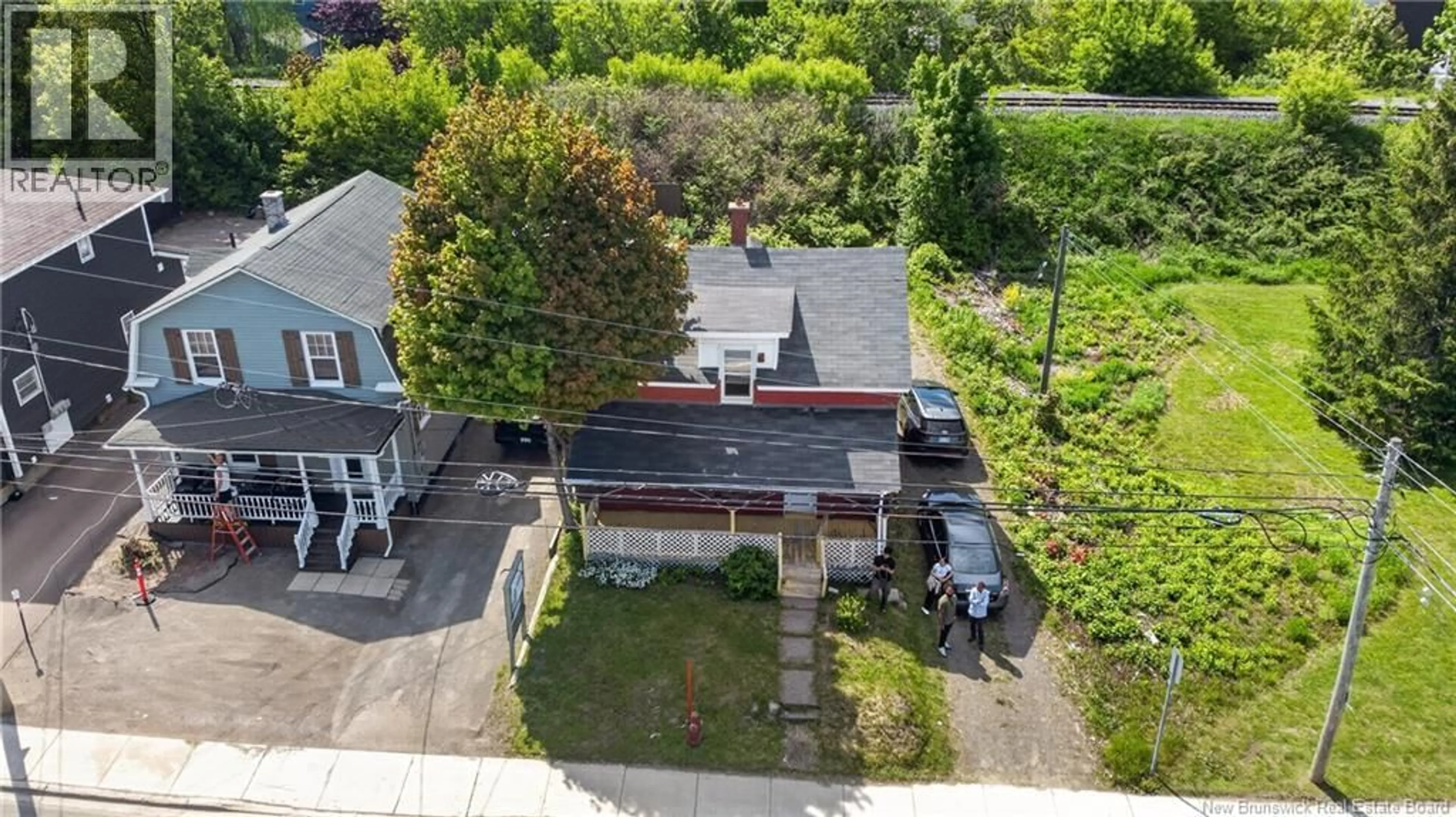 A pic from outside/outdoor area/front of a property/back of a property/a pic from drone, street for 292 BOTSFORD STREET, Moncton New Brunswick E1C4X7