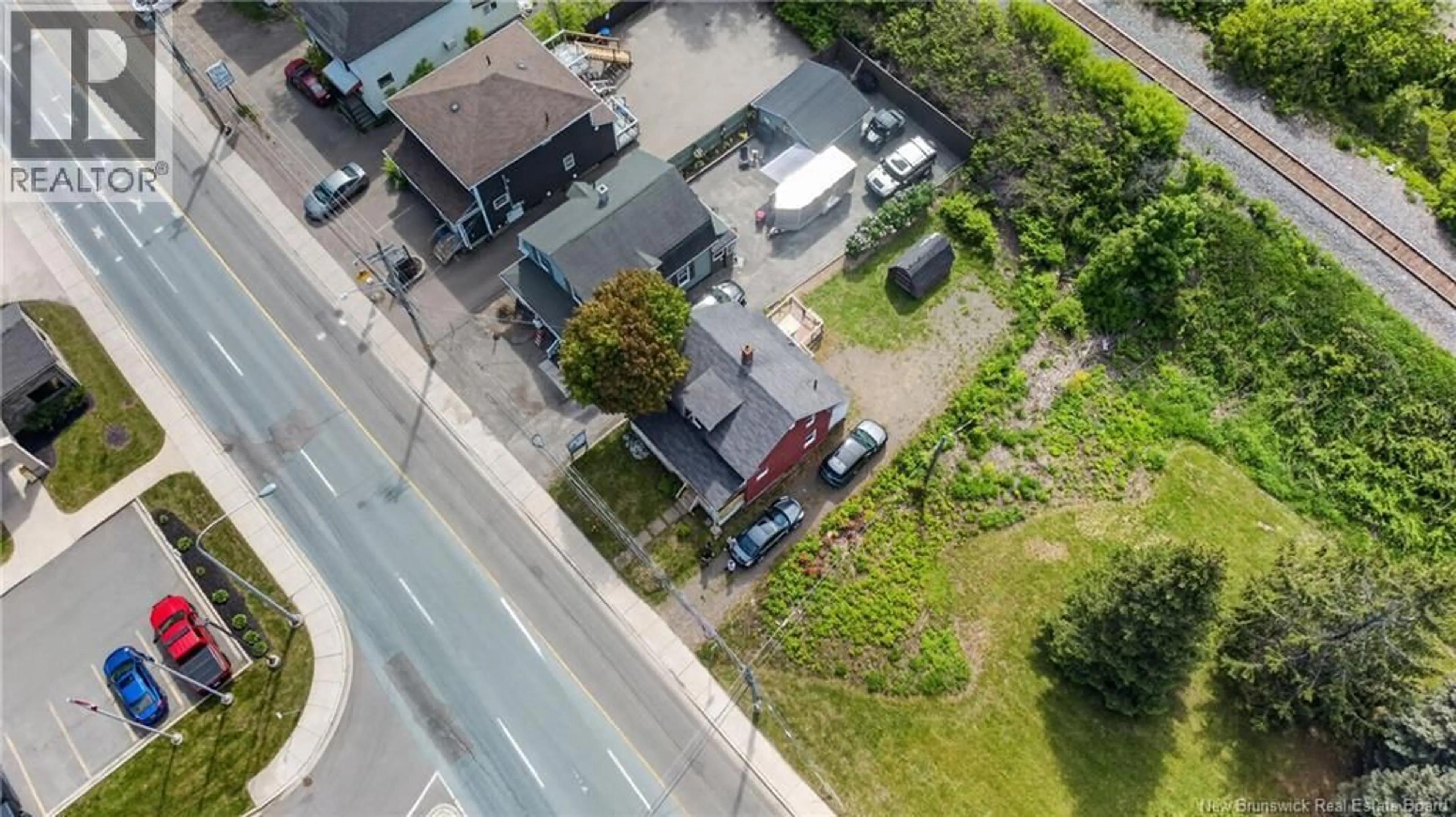 A pic from outside/outdoor area/front of a property/back of a property/a pic from drone, street for 292 BOTSFORD STREET, Moncton New Brunswick E1C4X7