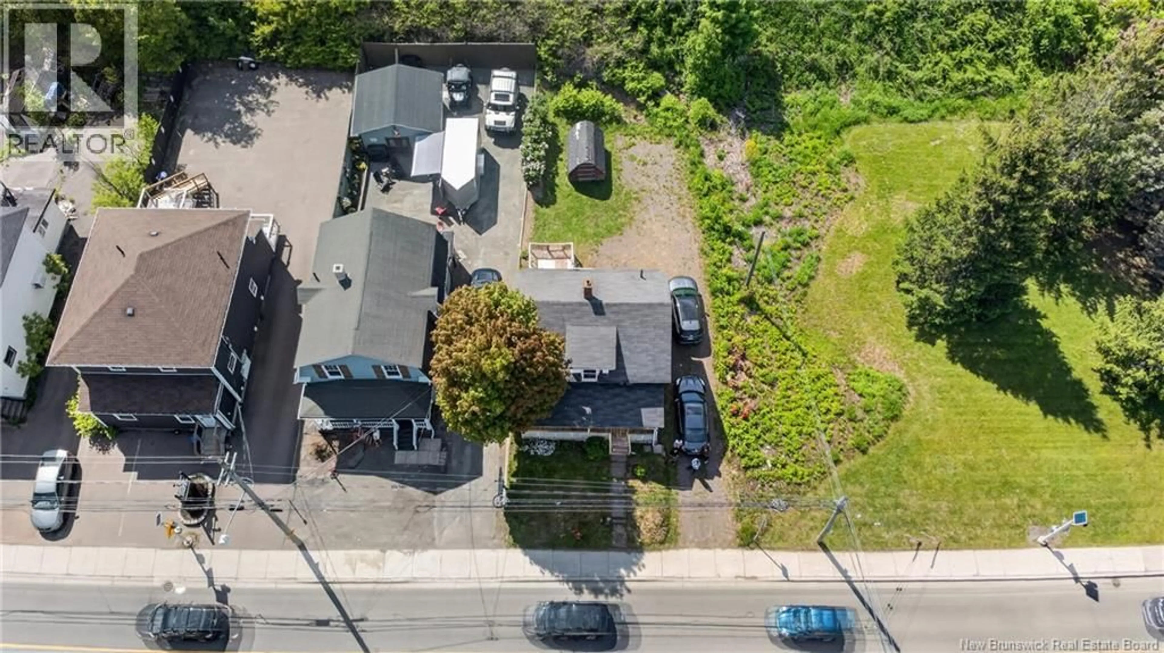 A pic from outside/outdoor area/front of a property/back of a property/a pic from drone, street for 292 BOTSFORD STREET, Moncton New Brunswick E1C4X7