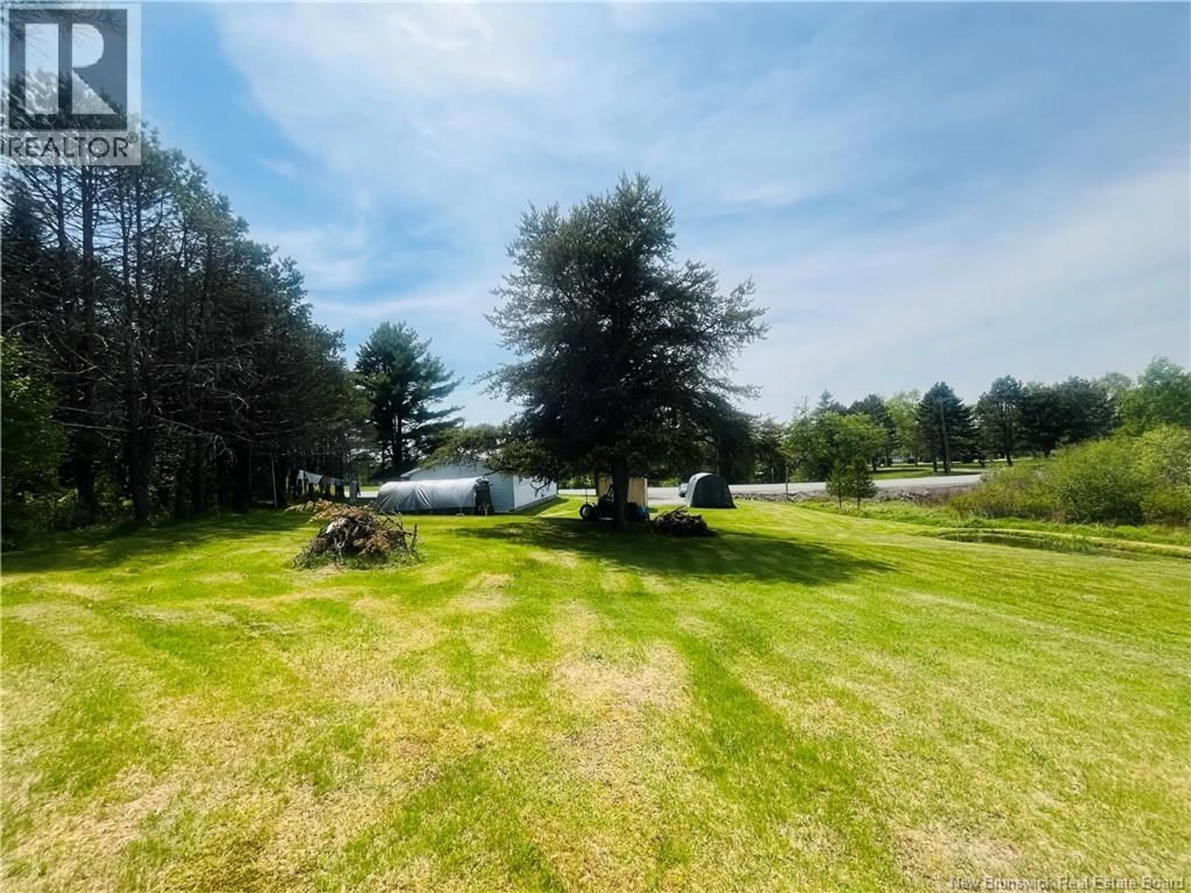 A pic from outside/outdoor area/front of a property/back of a property/a pic from drone, water/lake/river/ocean view for 90 NORTHWEST ROAD, Sunny Corner New Brunswick E9E1J4
