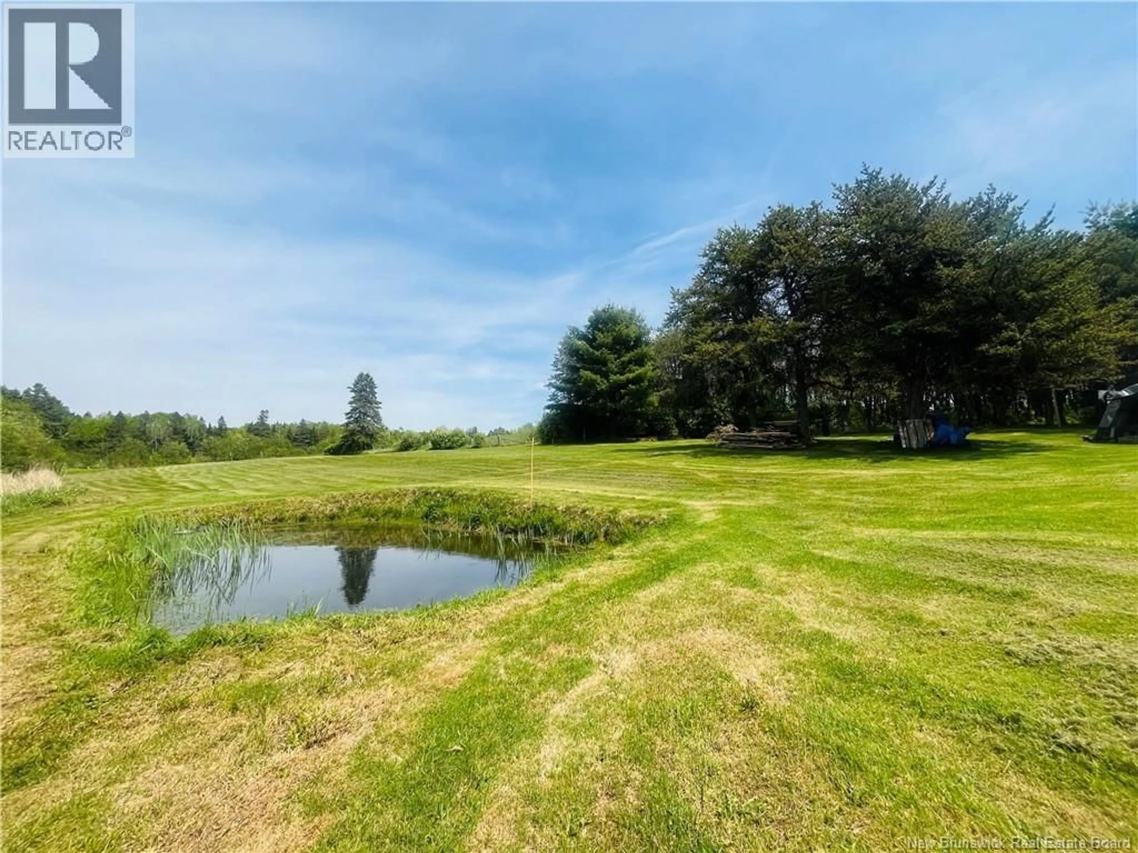 A pic from outside/outdoor area/front of a property/back of a property/a pic from drone, water/lake/river/ocean view for 90 NORTHWEST ROAD, Sunny Corner New Brunswick E9E1J4