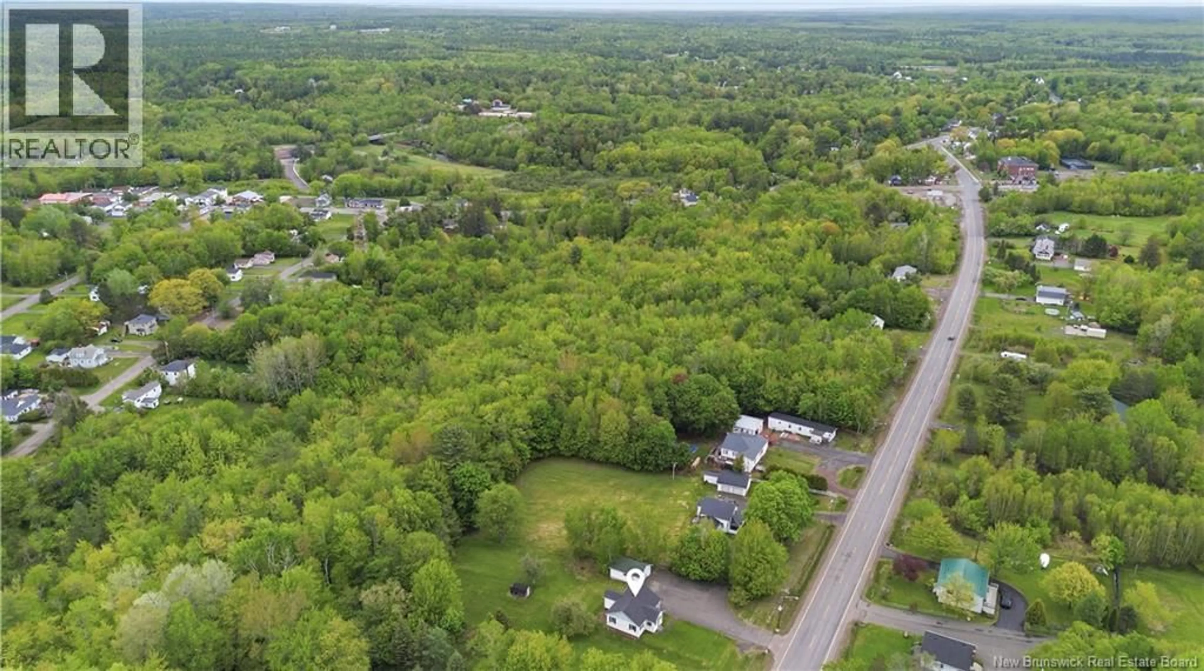 A pic from outside/outdoor area/front of a property/back of a property/a pic from drone, forest/trees view for 305 PLEASANT DRIVE, Minto New Brunswick E4B2S9
