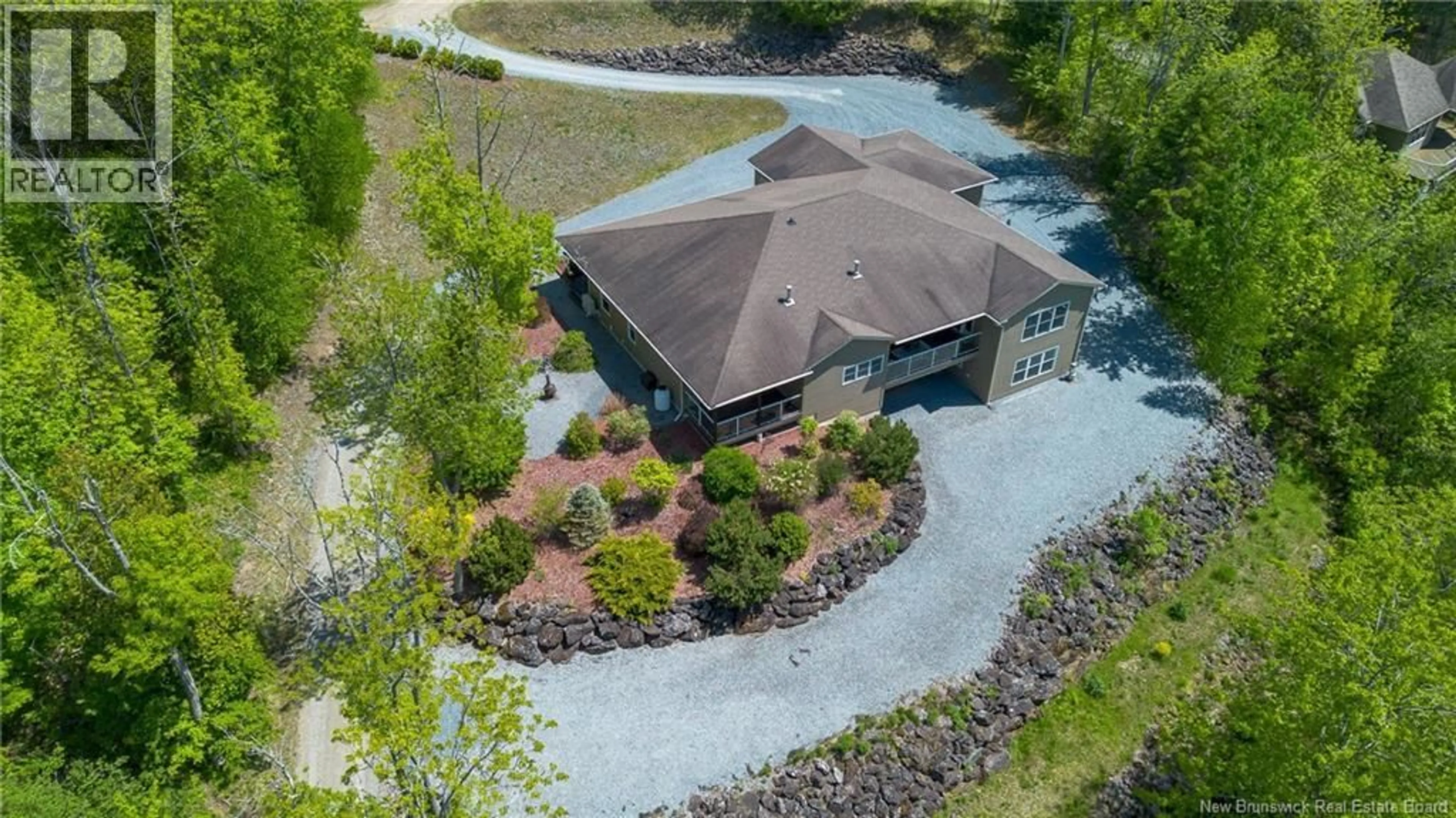 A pic from outside/outdoor area/front of a property/back of a property/a pic from drone, unknown for 53 CHESTNUT LANE, Kingston New Brunswick E5N0B2
