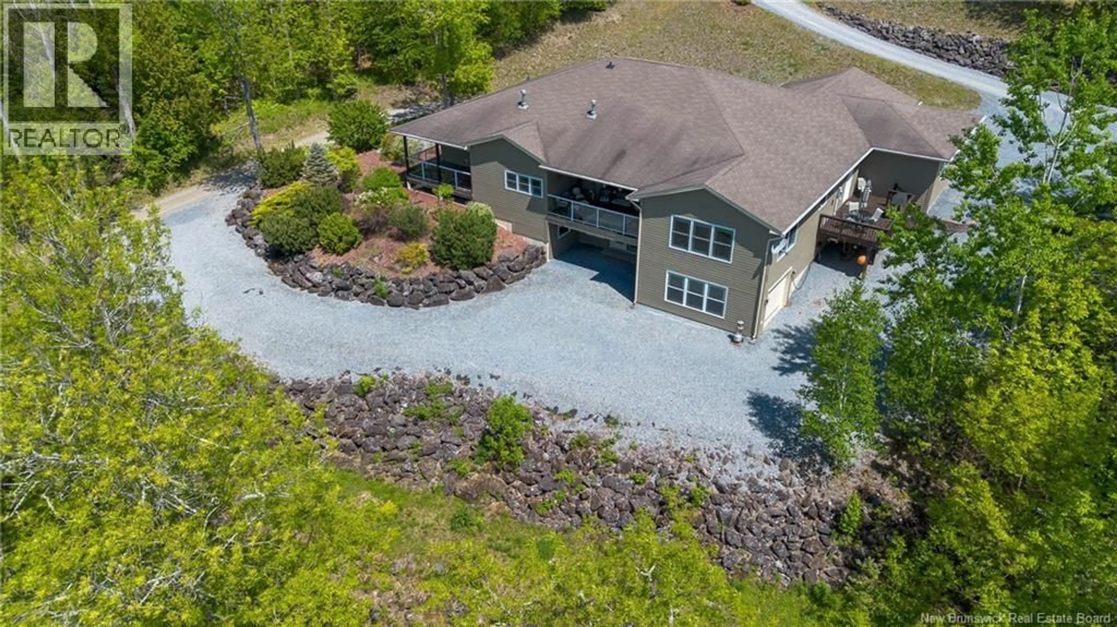 A pic from outside/outdoor area/front of a property/back of a property/a pic from drone, unknown for 53 CHESTNUT LANE, Kingston New Brunswick E5N0B2