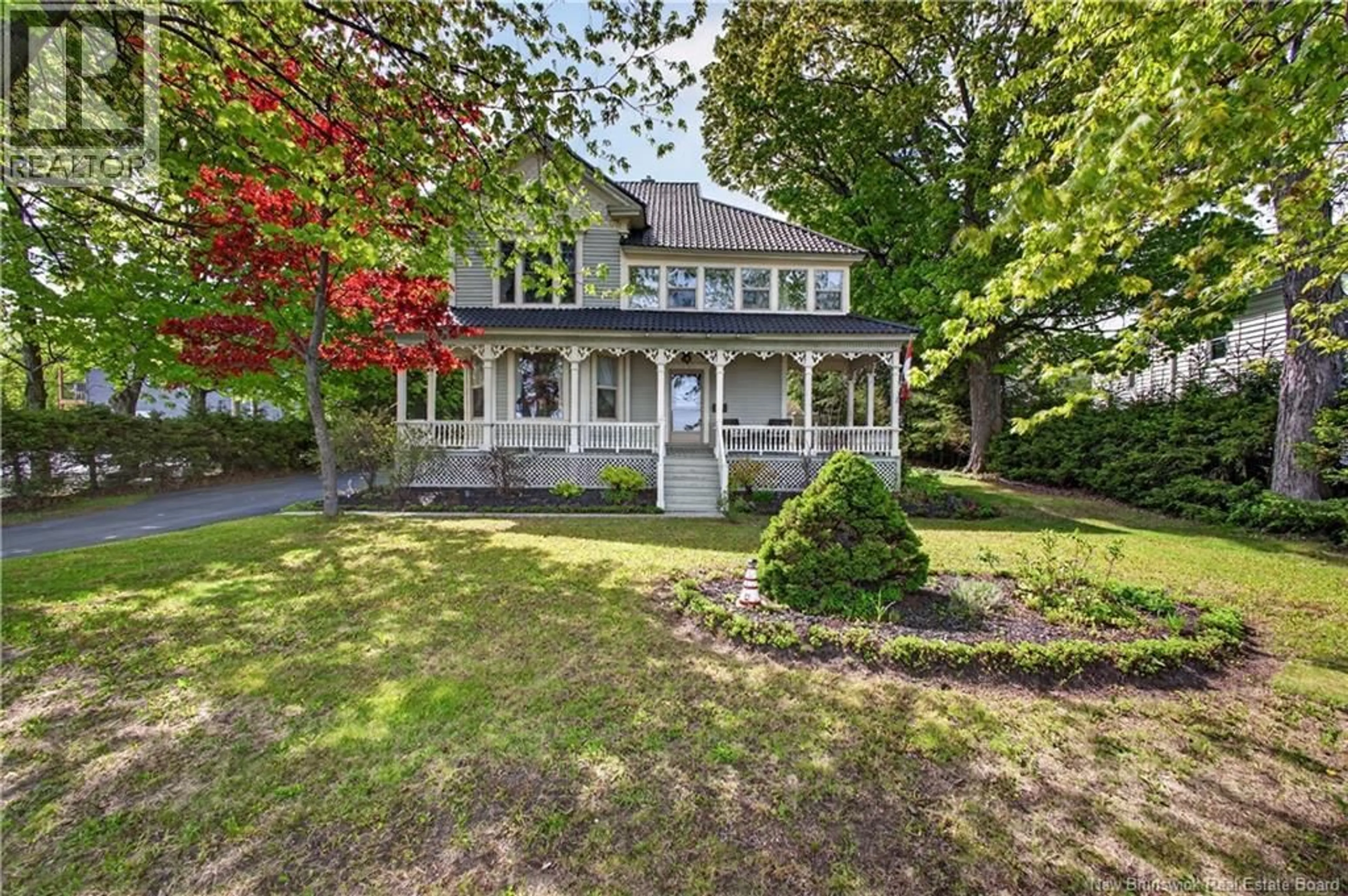 A pic from outside/outdoor area/front of a property/back of a property/a pic from drone, street for 1606 WATER STREET, Miramichi New Brunswick E1N1A8
