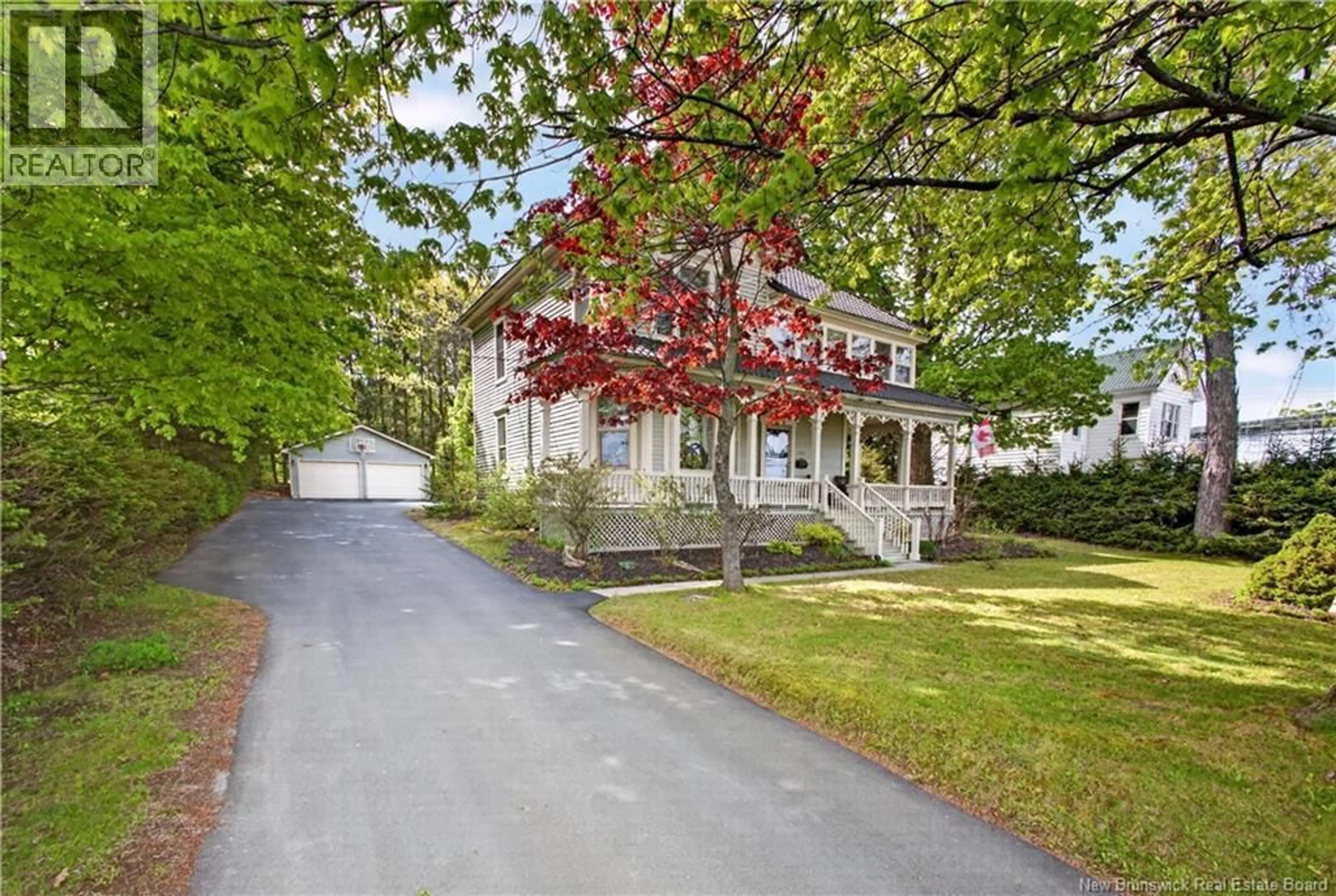 A pic from outside/outdoor area/front of a property/back of a property/a pic from drone, street for 1606 WATER STREET, Miramichi New Brunswick E1N1A8