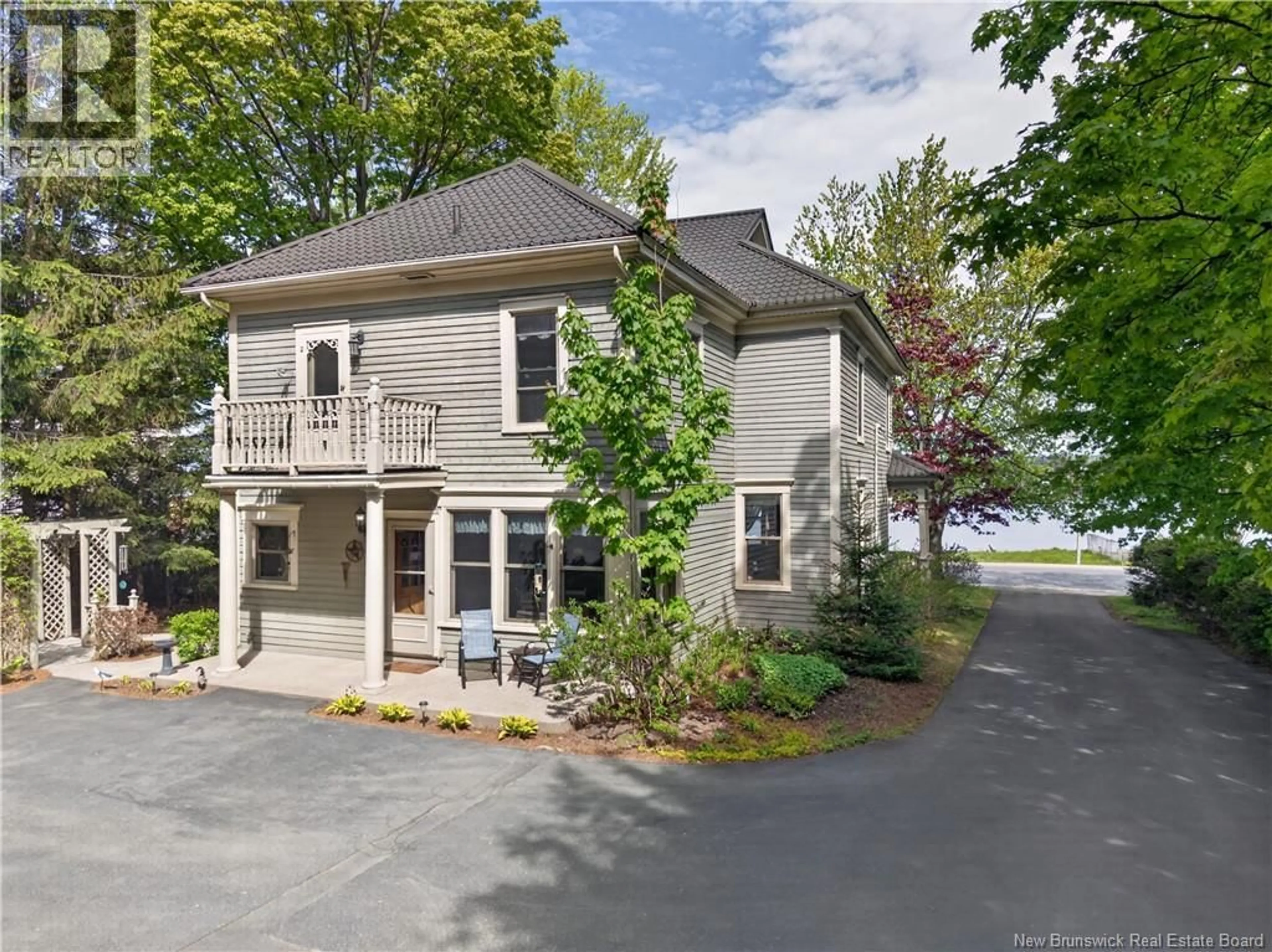 A pic from outside/outdoor area/front of a property/back of a property/a pic from drone, street for 1606 WATER STREET, Miramichi New Brunswick E1N1A8