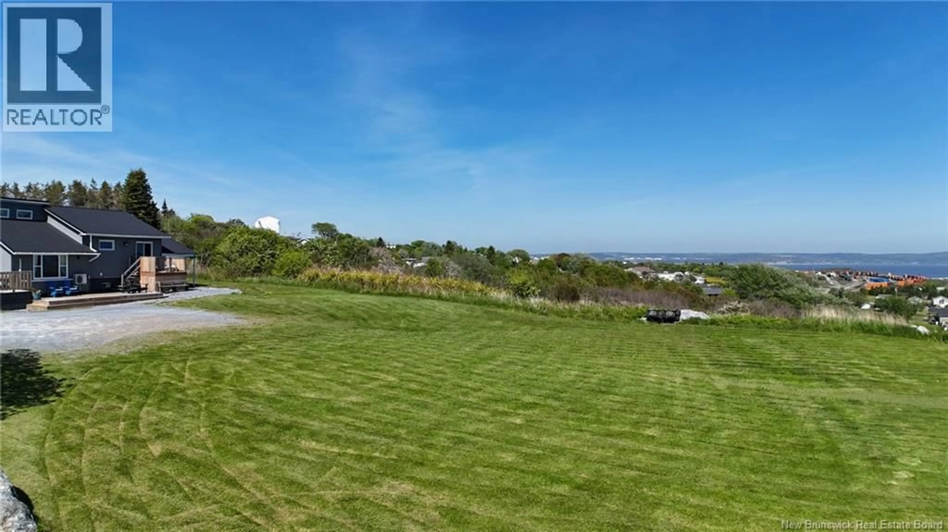 A pic from outside/outdoor area/front of a property/back of a property/a pic from drone, mountain view for 379 DEMILLE STREET, Saint John New Brunswick E2M2V6