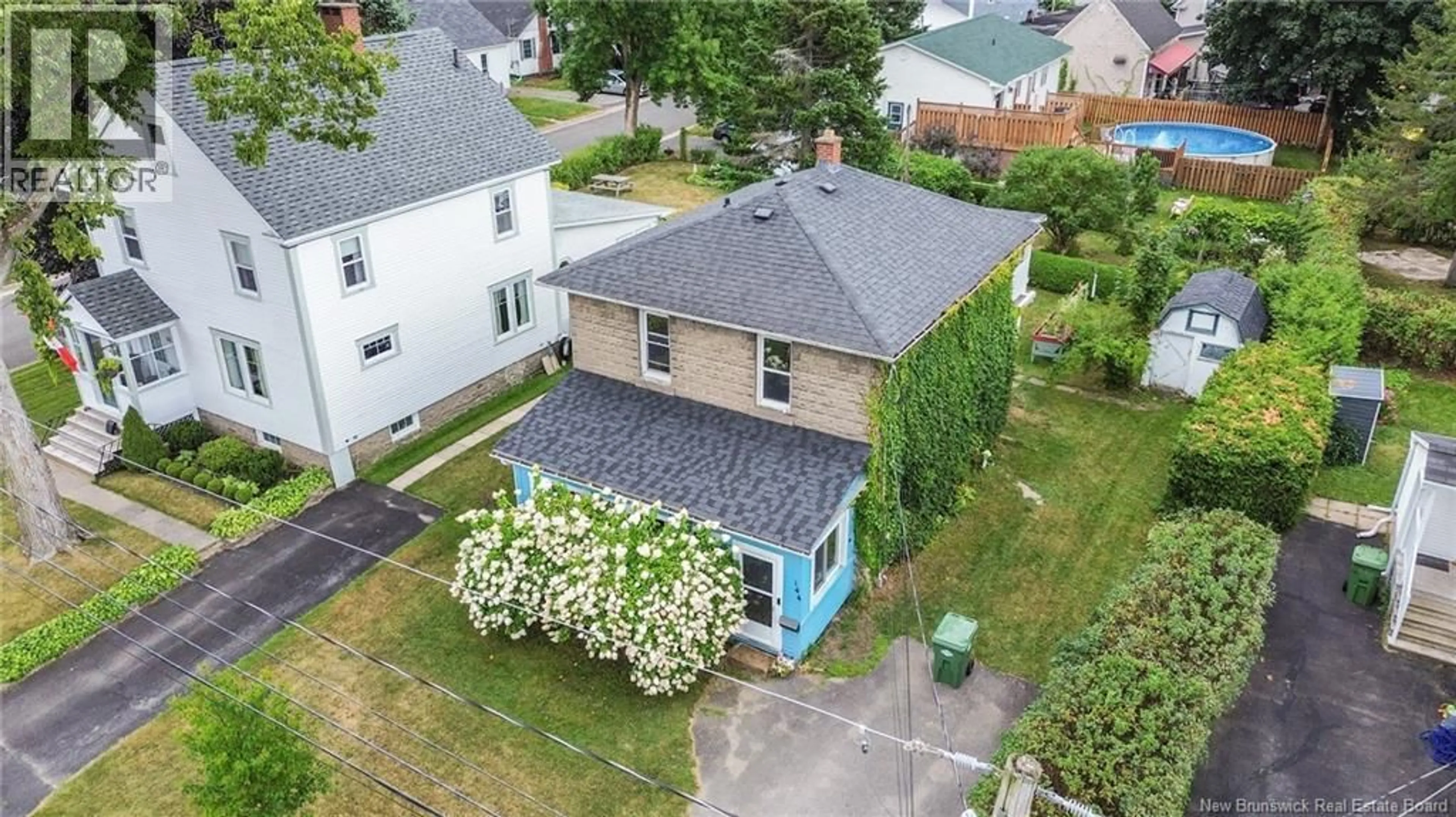 A pic from outside/outdoor area/front of a property/back of a property/a pic from drone, street for 144 HENRY STREET, Fredericton New Brunswick E3A3J1