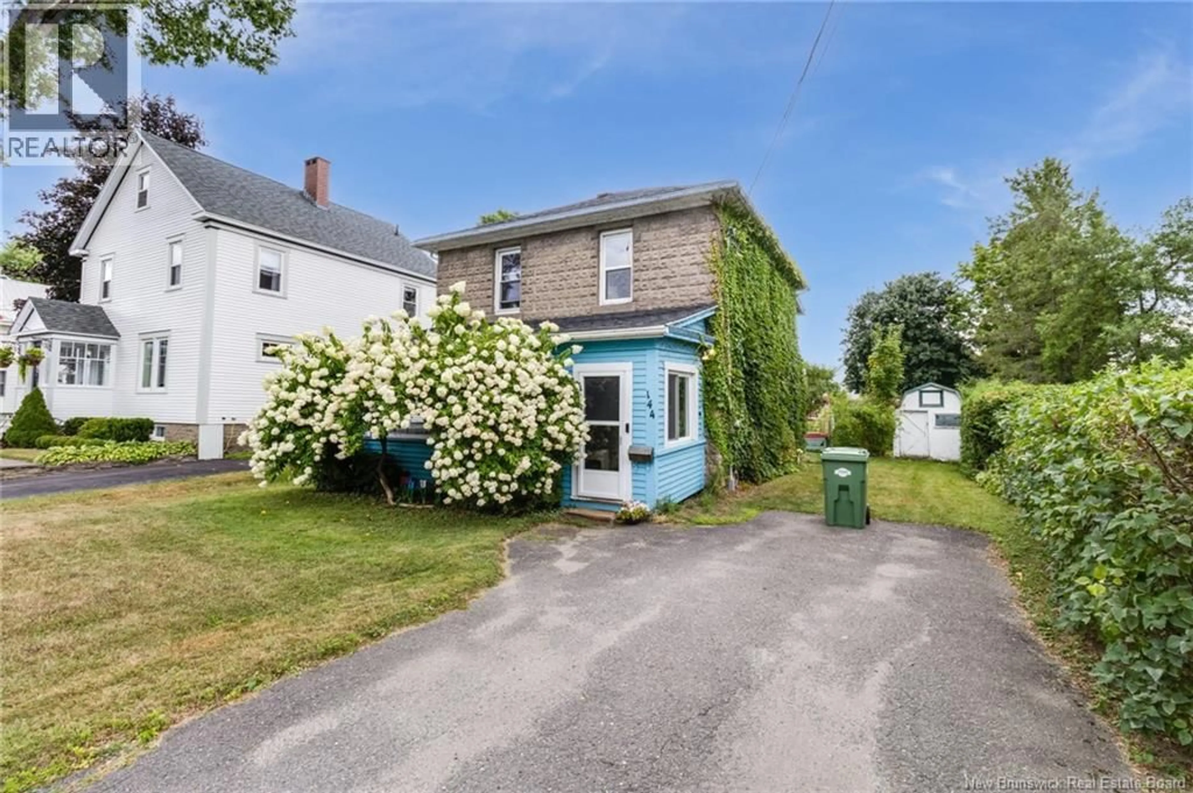 A pic from outside/outdoor area/front of a property/back of a property/a pic from drone, street for 144 HENRY STREET, Fredericton New Brunswick E3A3J1