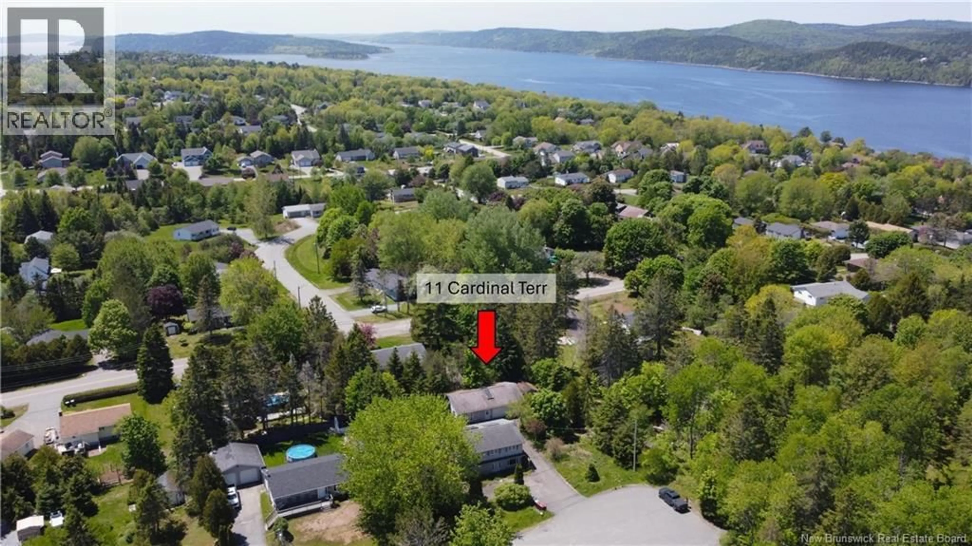 A pic from outside/outdoor area/front of a property/back of a property/a pic from drone, water/lake/river/ocean view for 11 CARDINAL TERRACE, Quispamsis New Brunswick E2E1M8