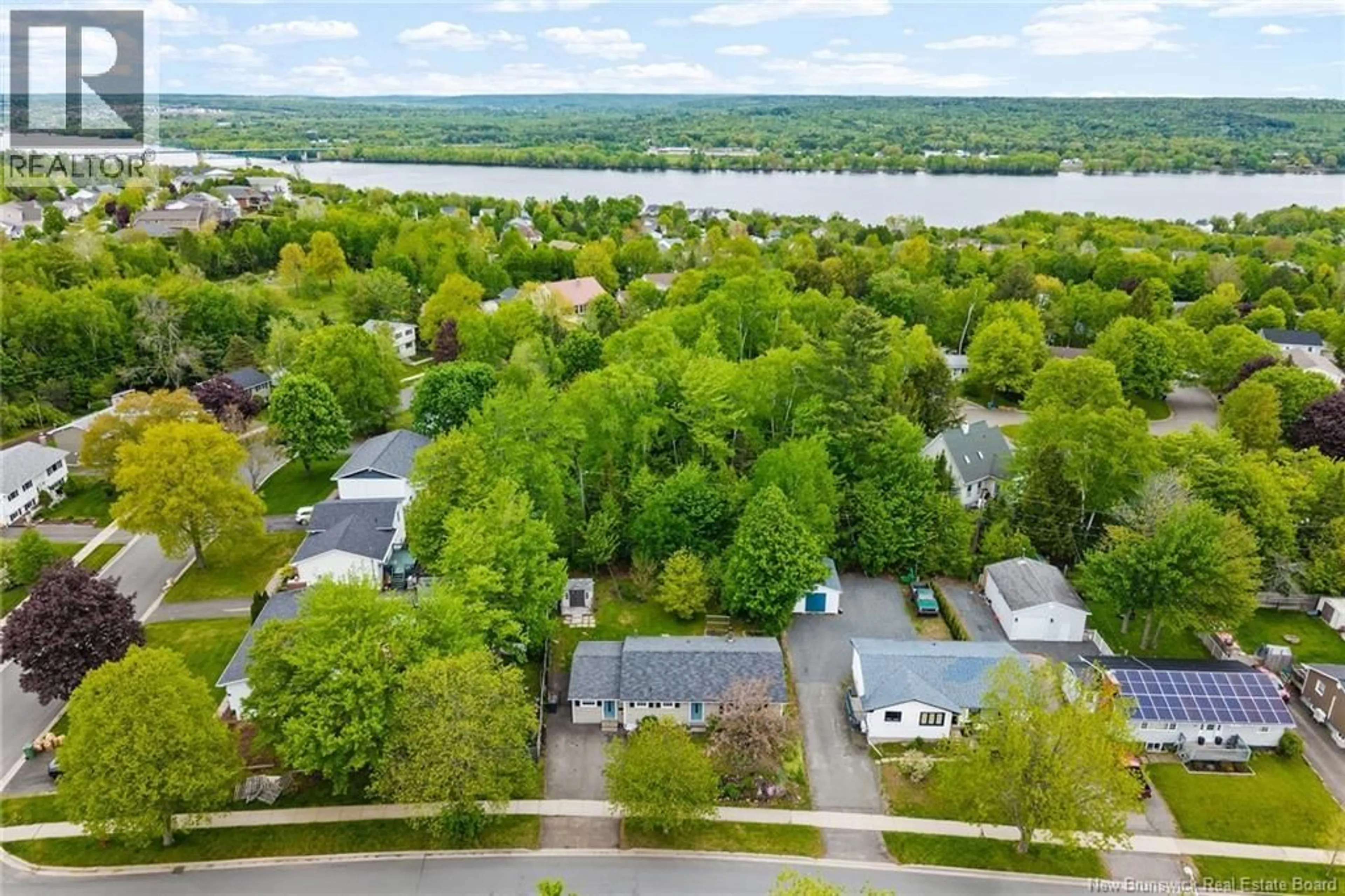 A pic from outside/outdoor area/front of a property/back of a property/a pic from drone, water/lake/river/ocean view for 75 CHANDLER DRIVE, Fredericton New Brunswick E3B5S6