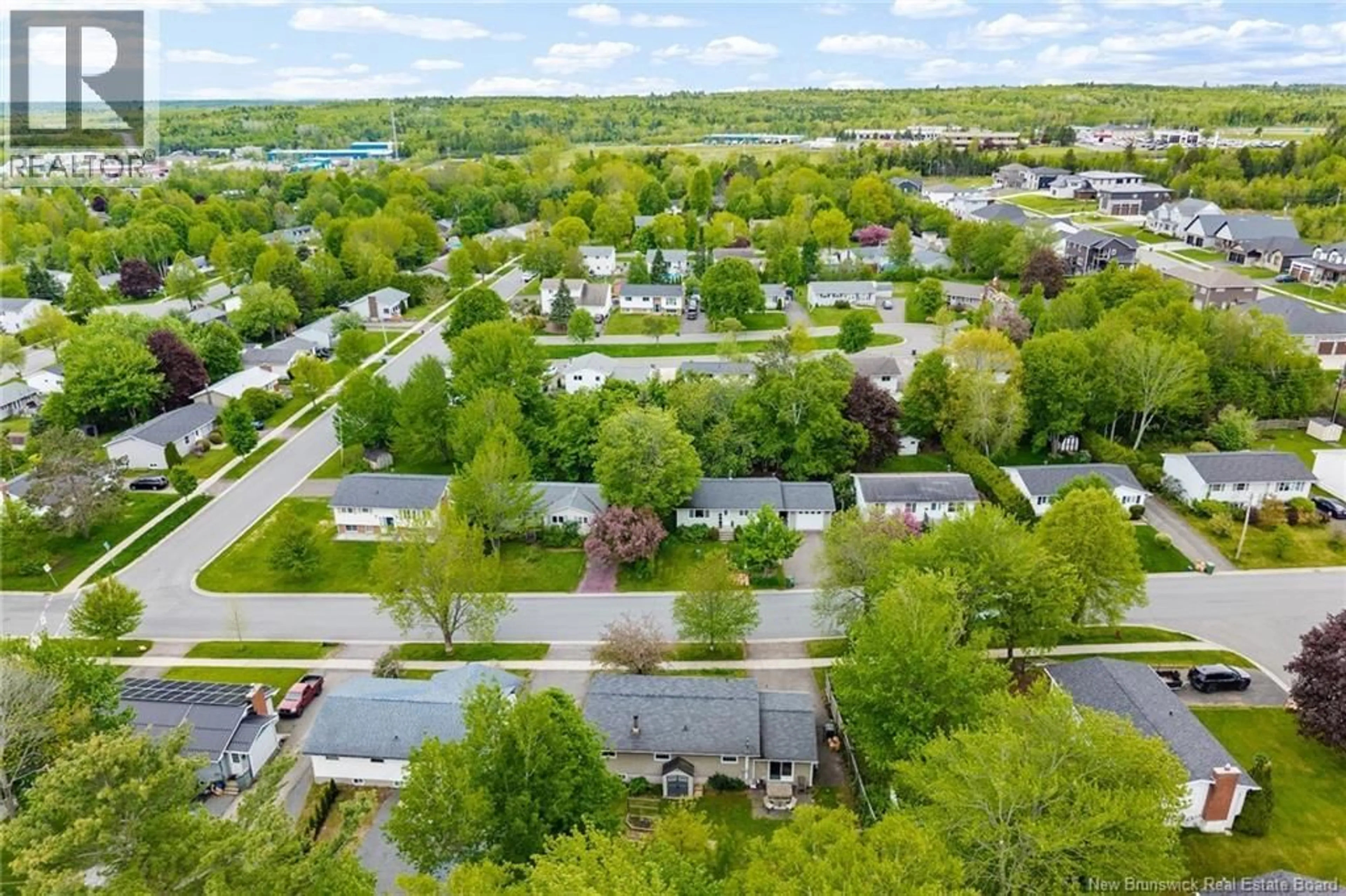 A pic from outside/outdoor area/front of a property/back of a property/a pic from drone, street for 75 CHANDLER DRIVE, Fredericton New Brunswick E3B5S6