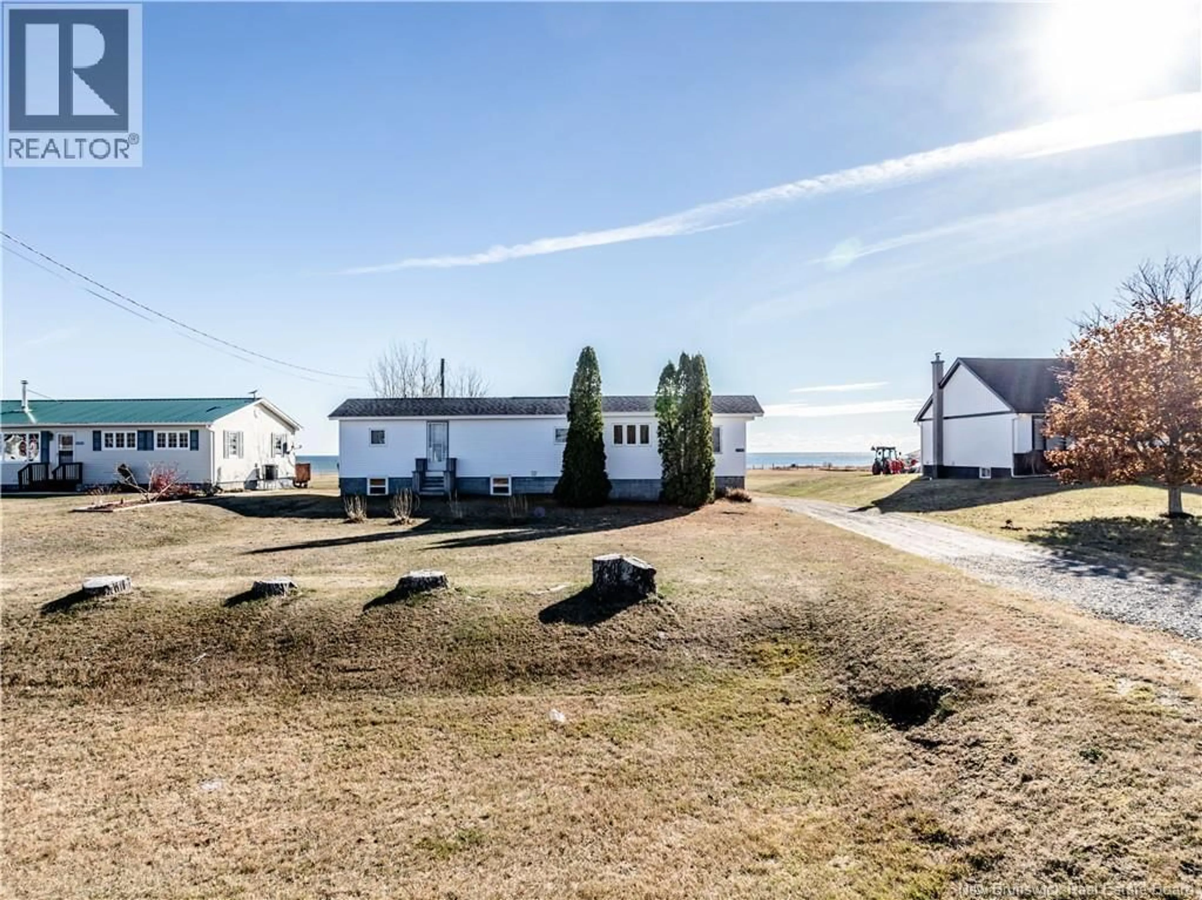 A pic from outside/outdoor area/front of a property/back of a property/a pic from drone, unknown for 3080 ROUTE 117, Pointe-Sapin New Brunswick E9A1T3