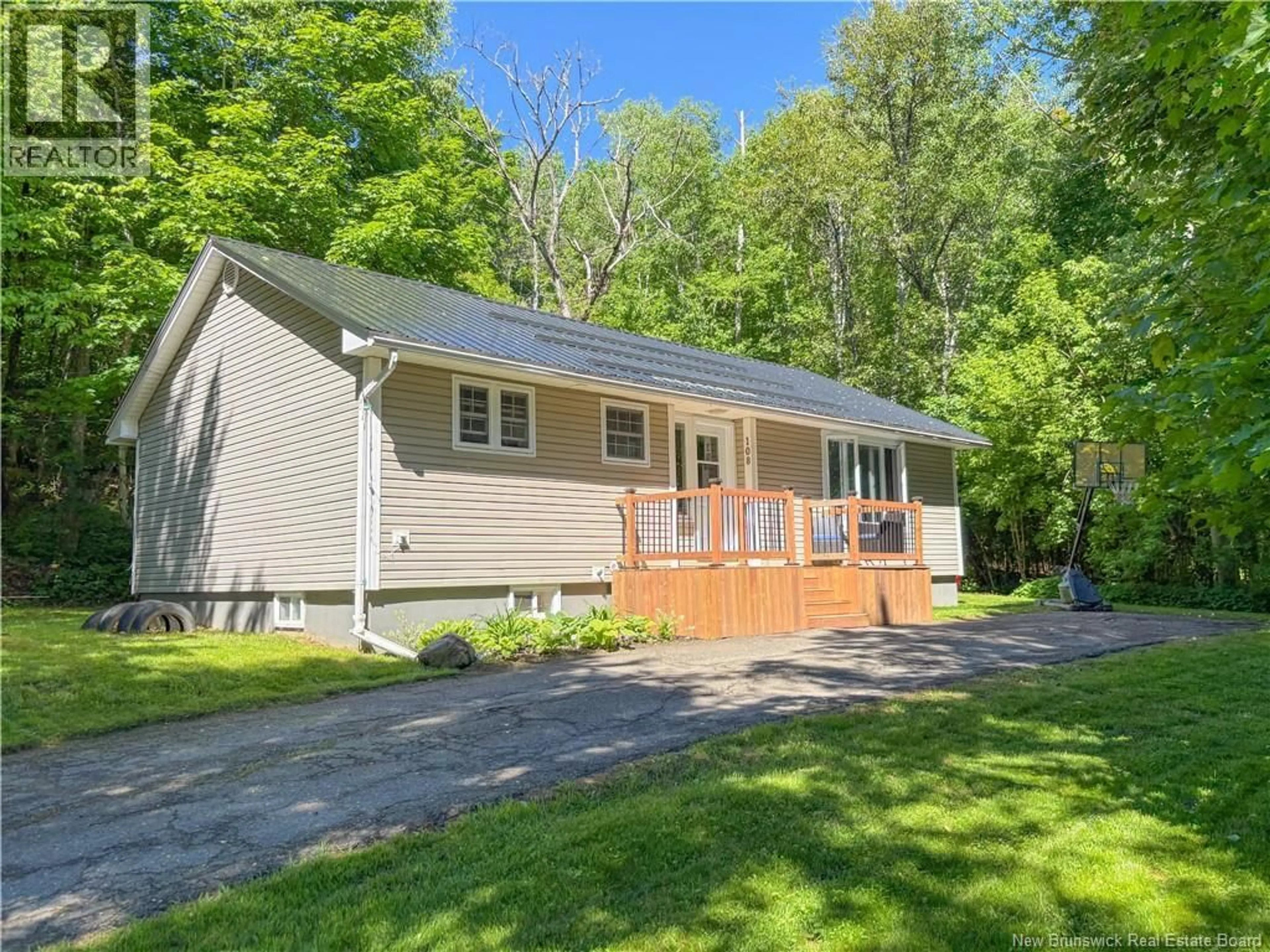 Home with vinyl exterior material, street for 108 SHARKEY STREET, Woodstock New Brunswick E7M2R2