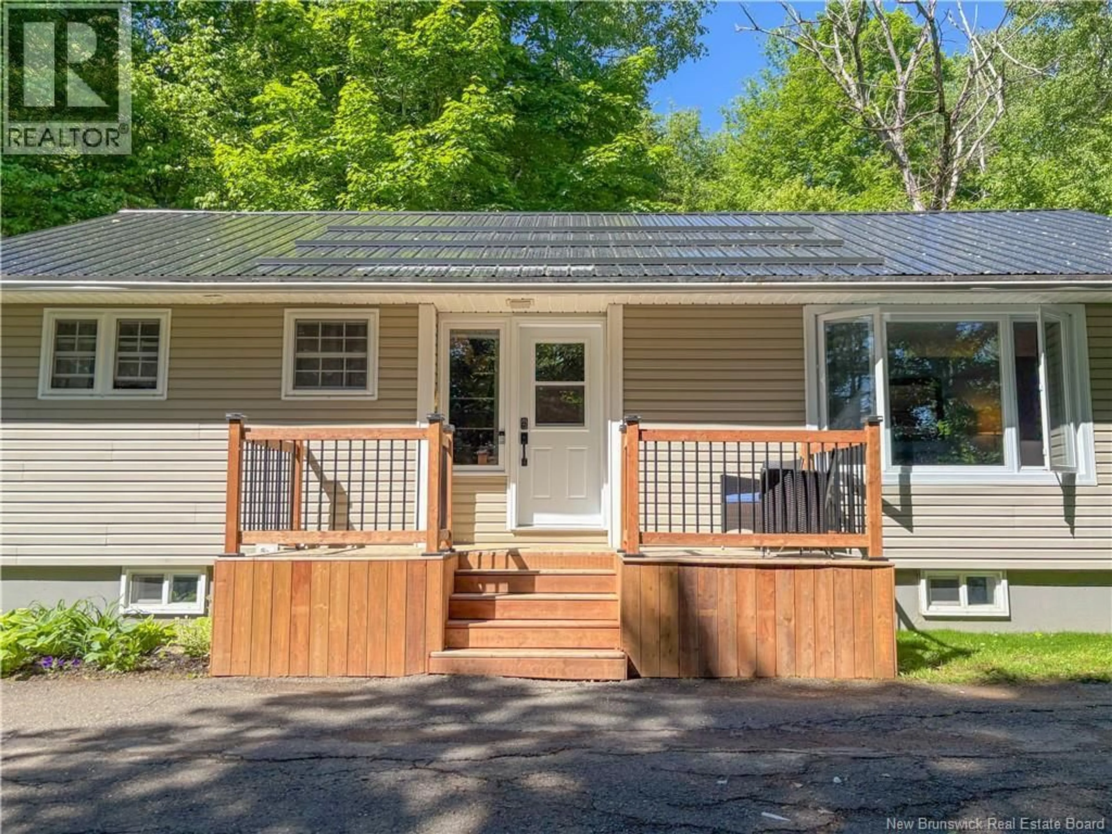 Home with vinyl exterior material, street for 108 SHARKEY STREET, Woodstock New Brunswick E7M2R2
