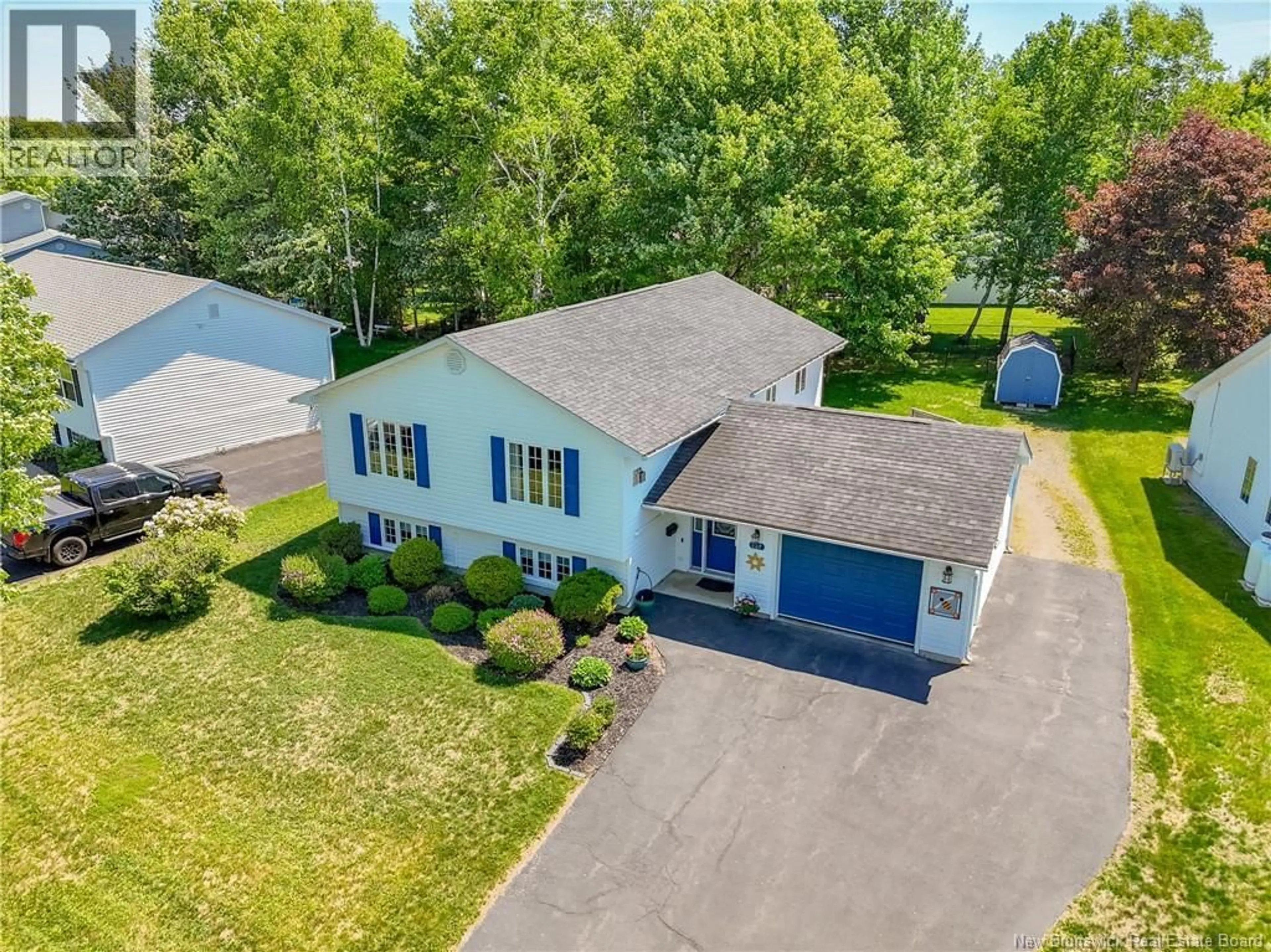 A pic from outside/outdoor area/front of a property/back of a property/a pic from drone, street for 137 MANRESA DRIVE, Fredericton New Brunswick E3A9S9