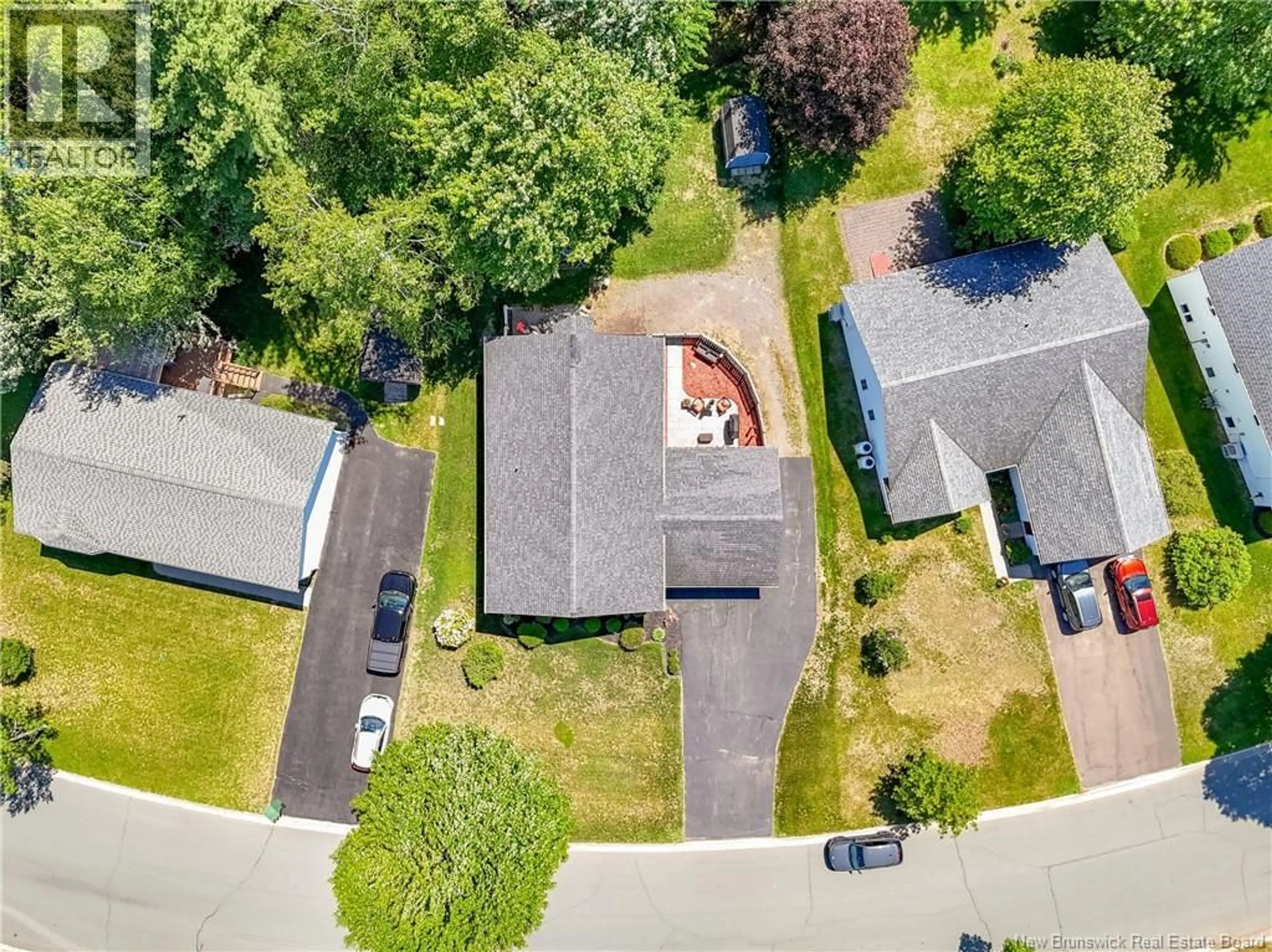 A pic from outside/outdoor area/front of a property/back of a property/a pic from drone, street for 137 MANRESA DRIVE, Fredericton New Brunswick E3A9S9