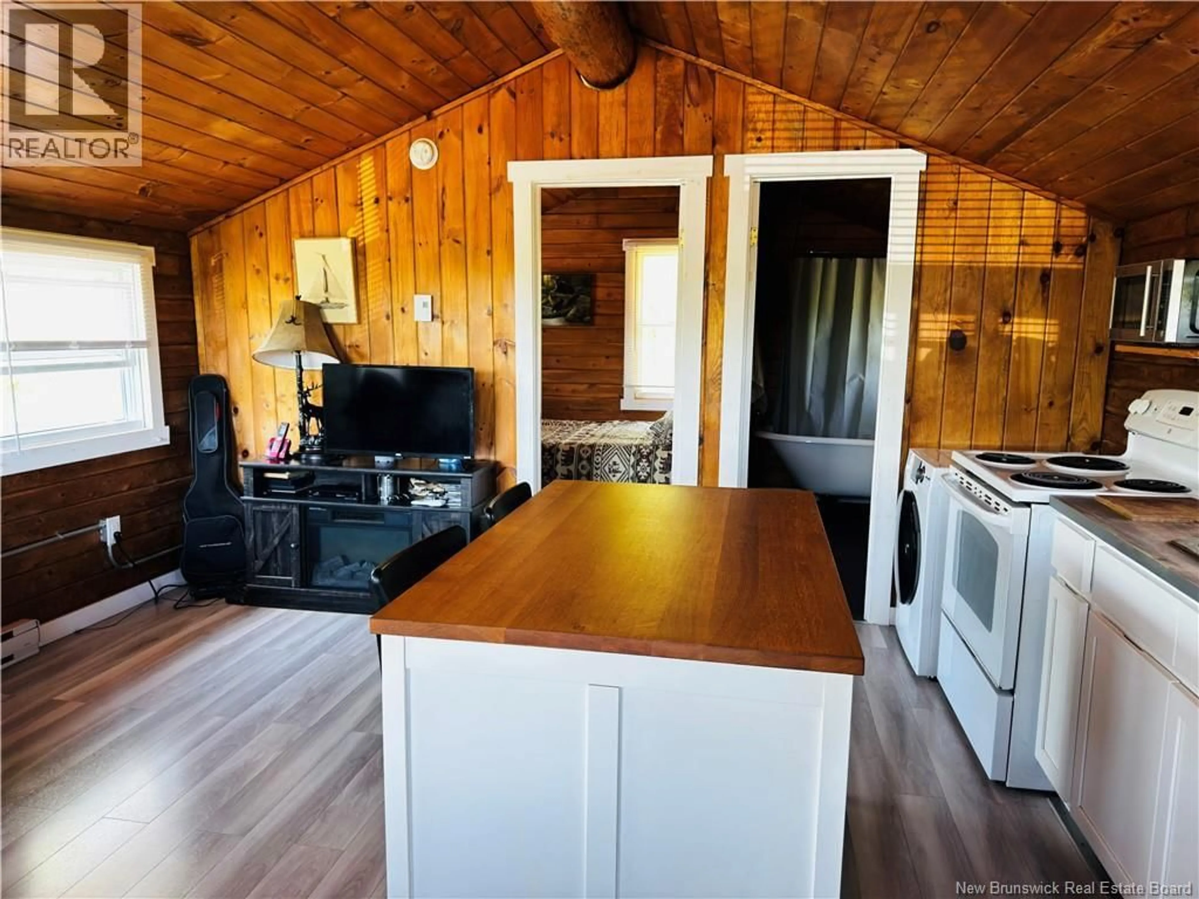Open concept kitchen, wood/laminate floor for 968 ST. MAURICE, Bouctouche New Brunswick E4S5C5