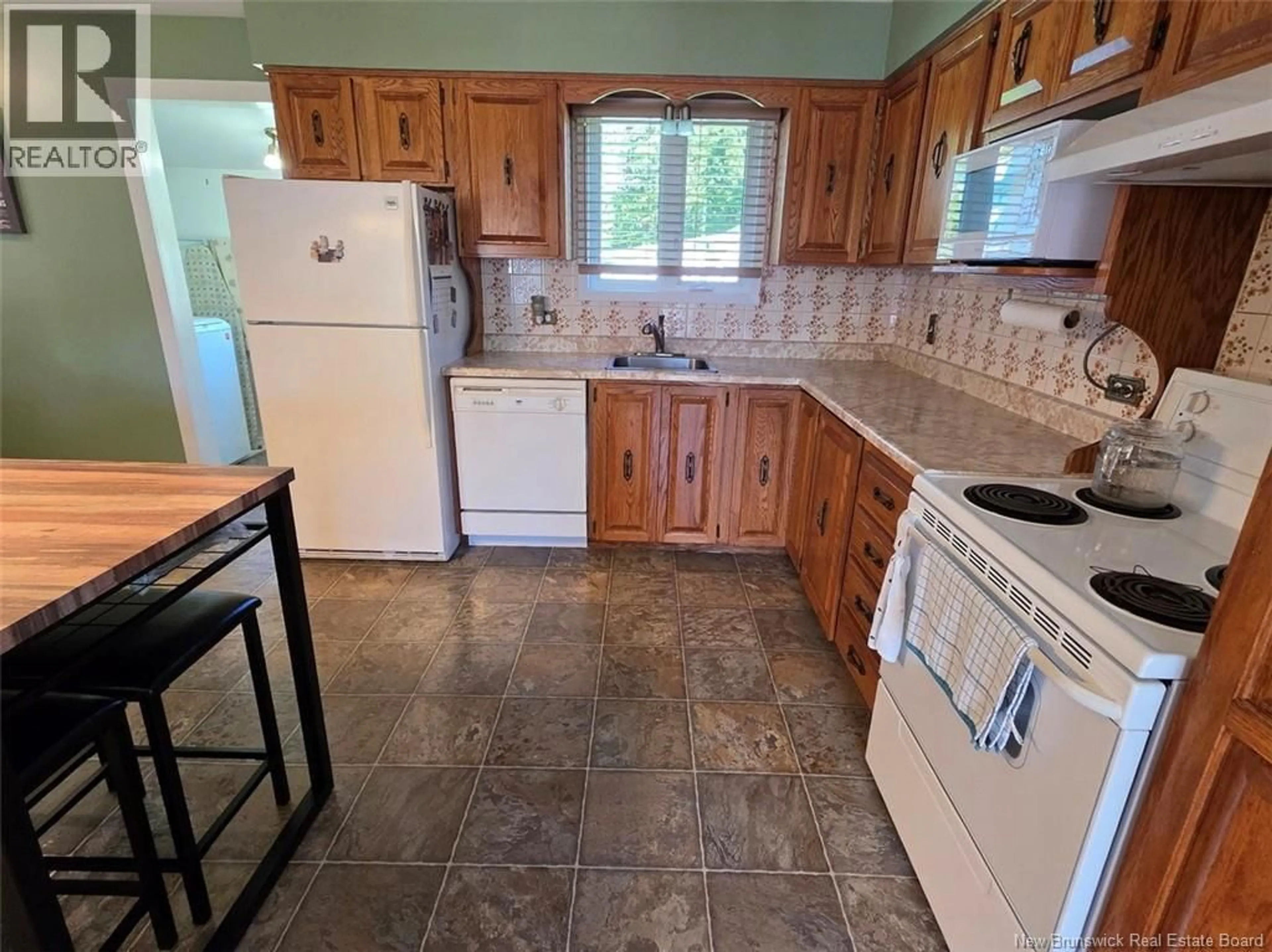 Standard kitchen, ceramic/tile floor for 18 DES SOEURS STREET, Saint-Jacques New Brunswick E7B1G6