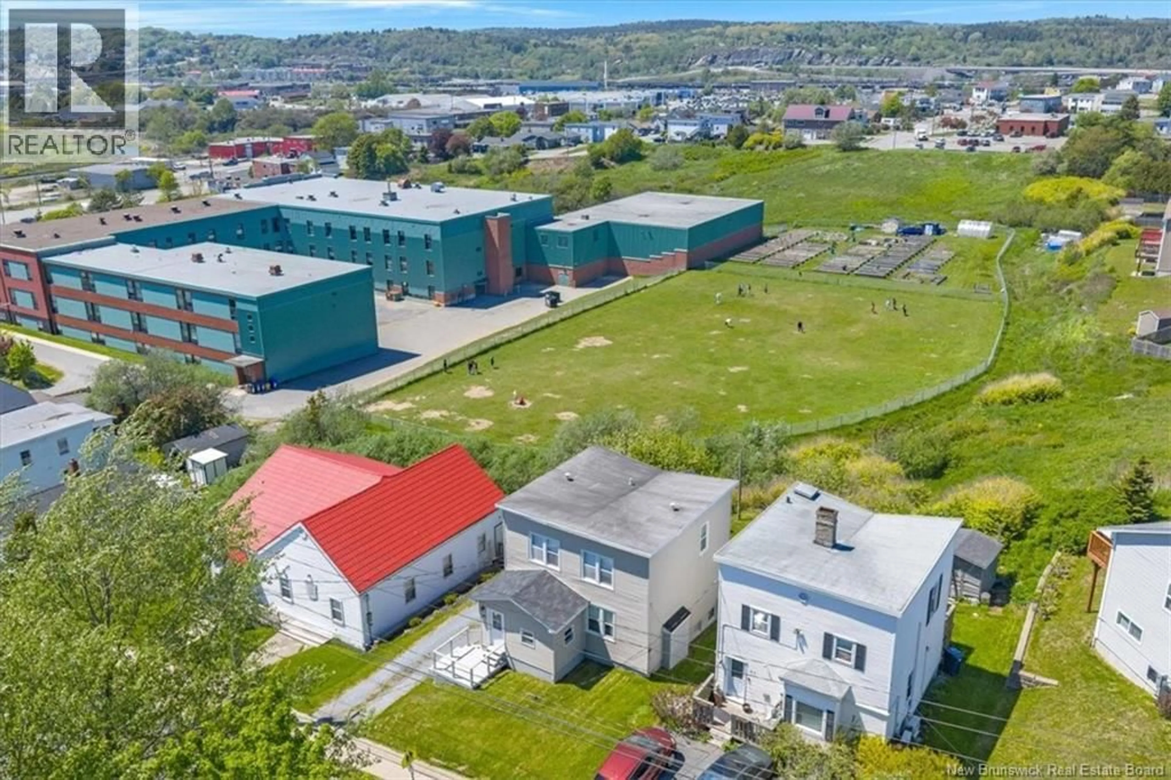 A pic from outside/outdoor area/front of a property/back of a property/a pic from drone, mountain view for 65 COURTENAY AVENUE, Saint John New Brunswick E2J1M6