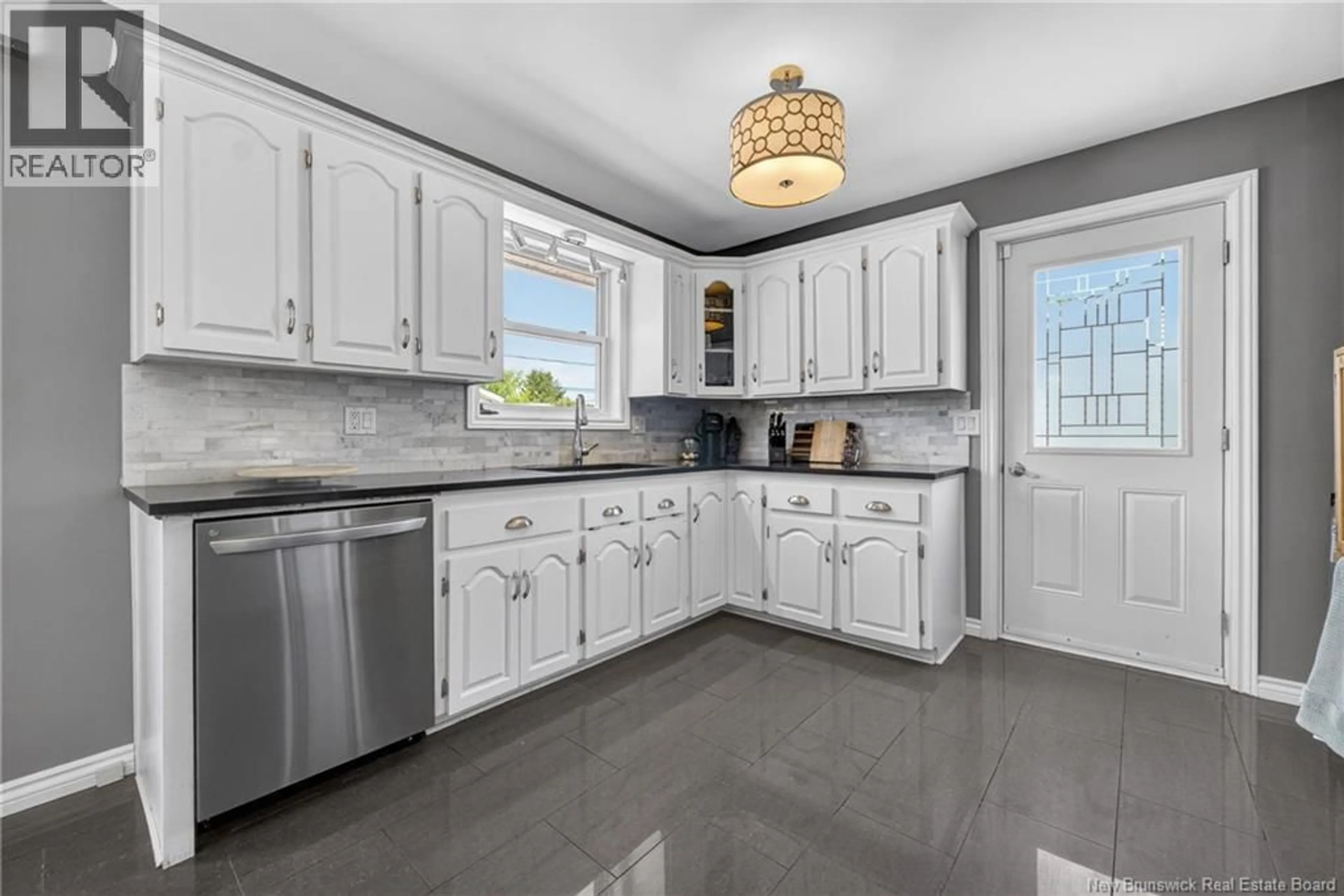 Open concept kitchen, ceramic/tile floor for 115 HIGHMEADOW DRIVE, Moncton New Brunswick E1G2B8