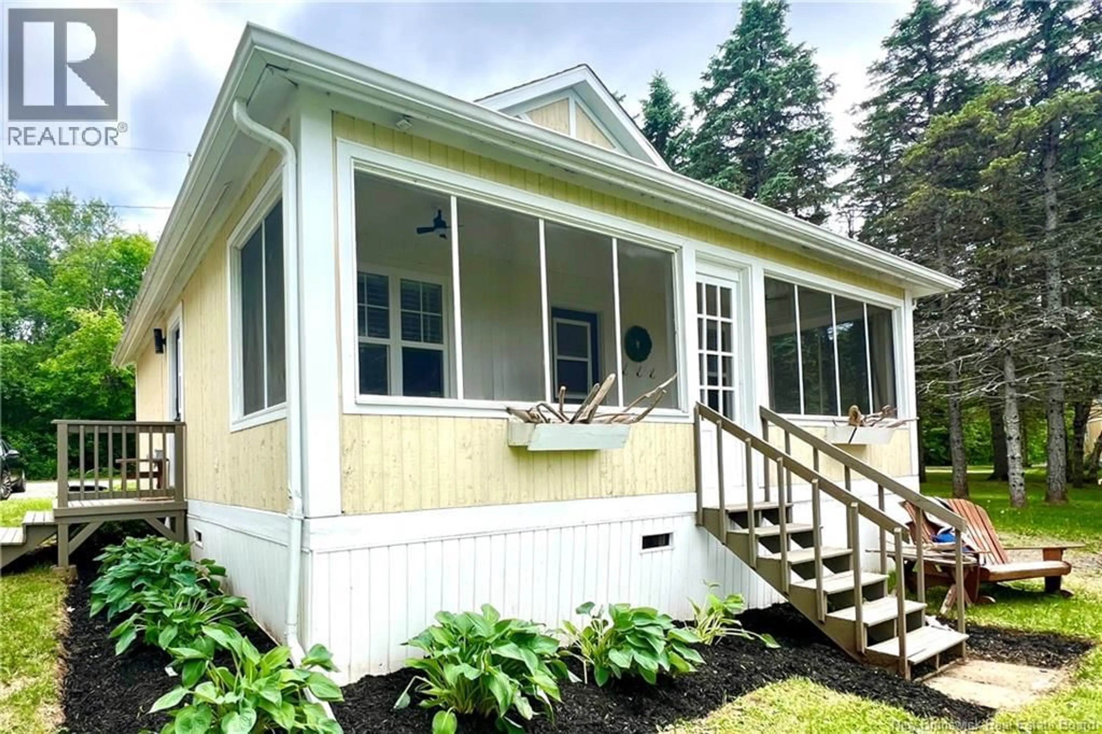 Home with vinyl exterior material, street for 15 - 23 ACADIE, Bouctouche New Brunswick E4S2T6