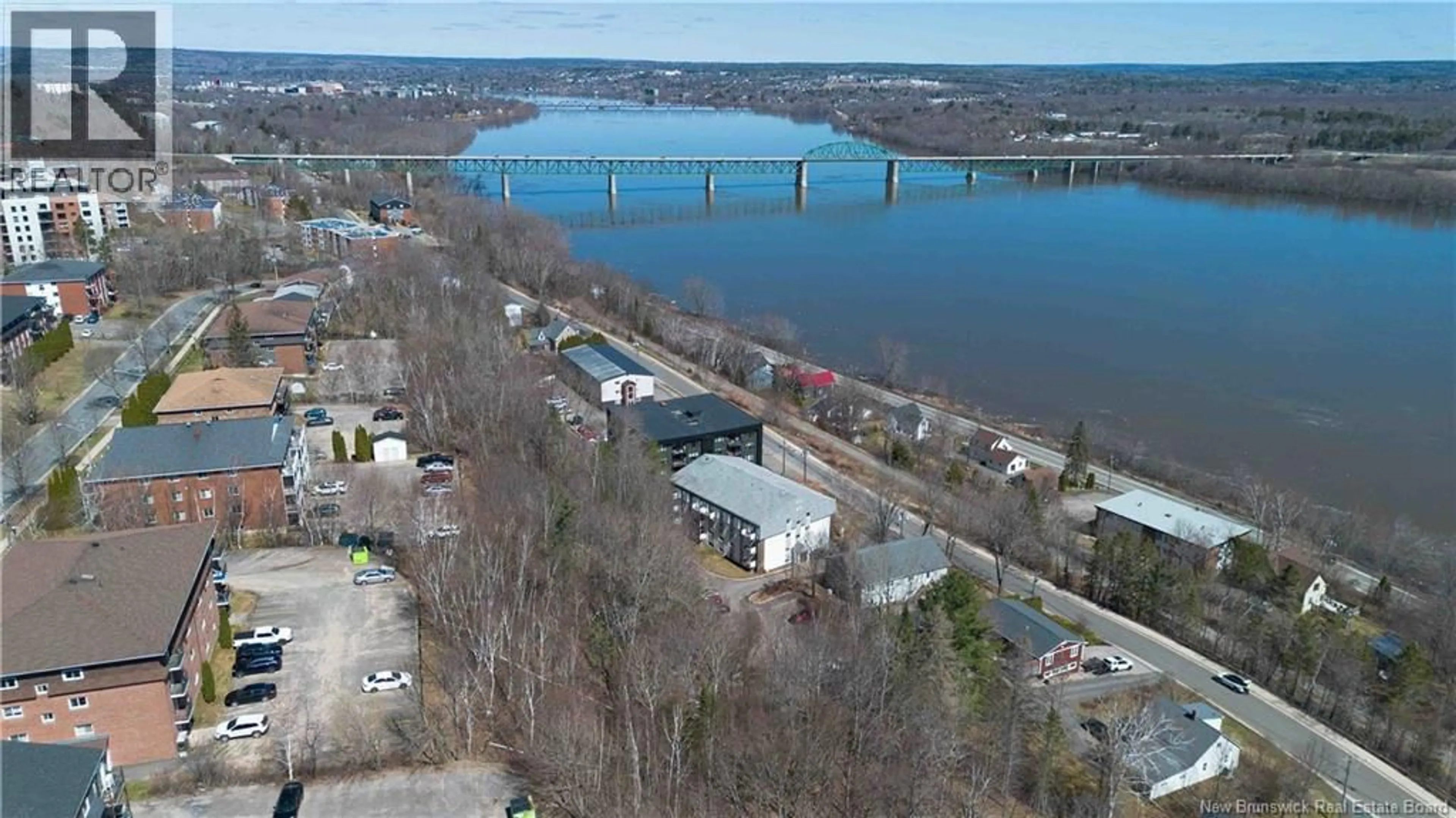 A pic from outside/outdoor area/front of a property/back of a property/a pic from drone, water/lake/river/ocean view for 5 - 228 DUNN'S CROSSING ROAD, Fredericton New Brunswick E3B2A6