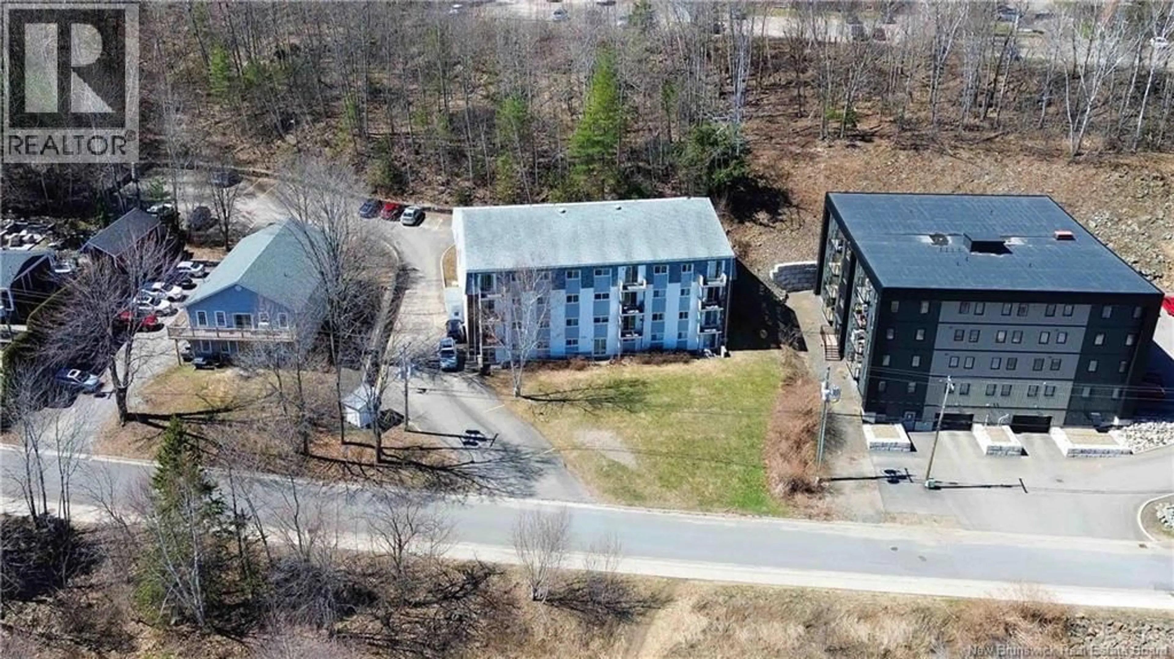 A pic from outside/outdoor area/front of a property/back of a property/a pic from drone, unknown for 5 - 228 DUNN'S CROSSING ROAD, Fredericton New Brunswick E3B2A6