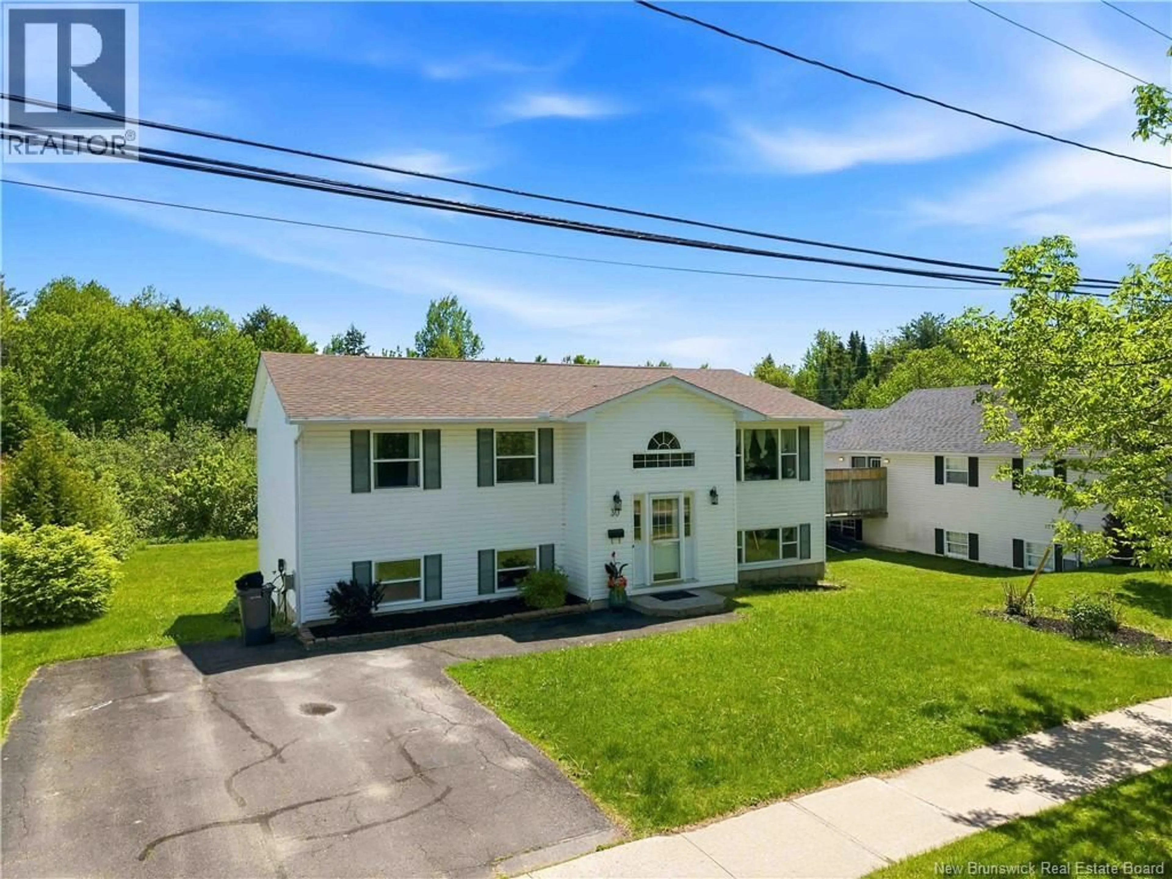 A pic from outside/outdoor area/front of a property/back of a property/a pic from drone, street for 30 LEISURE AVENUE, Fredericton New Brunswick E3B9K8