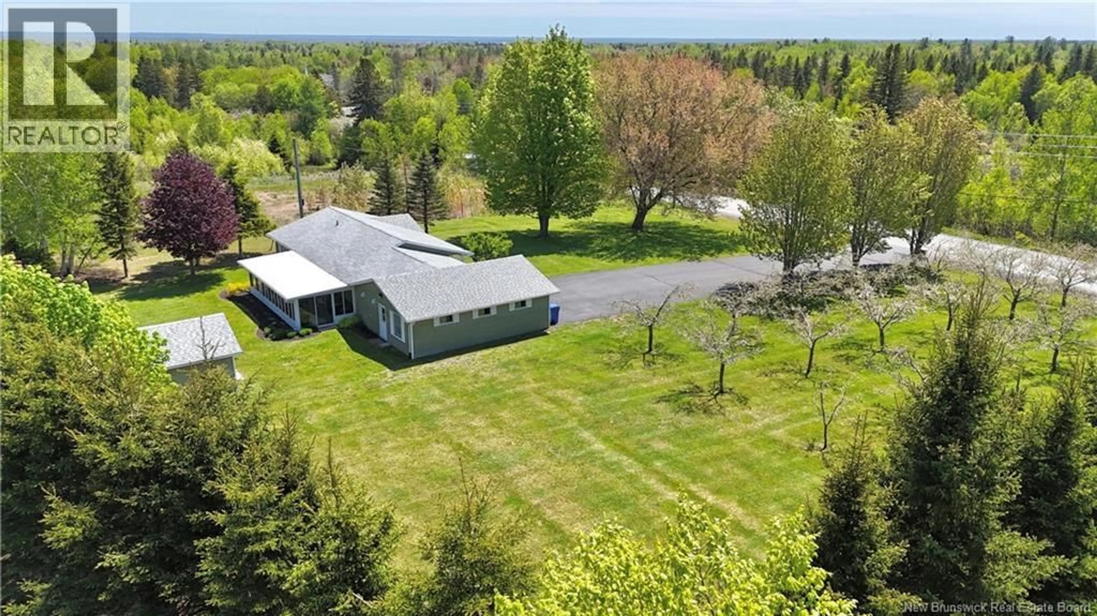 A pic from outside/outdoor area/front of a property/back of a property/a pic from drone, unknown for 2260 SUNSET, Bathurst New Brunswick E2A7K8