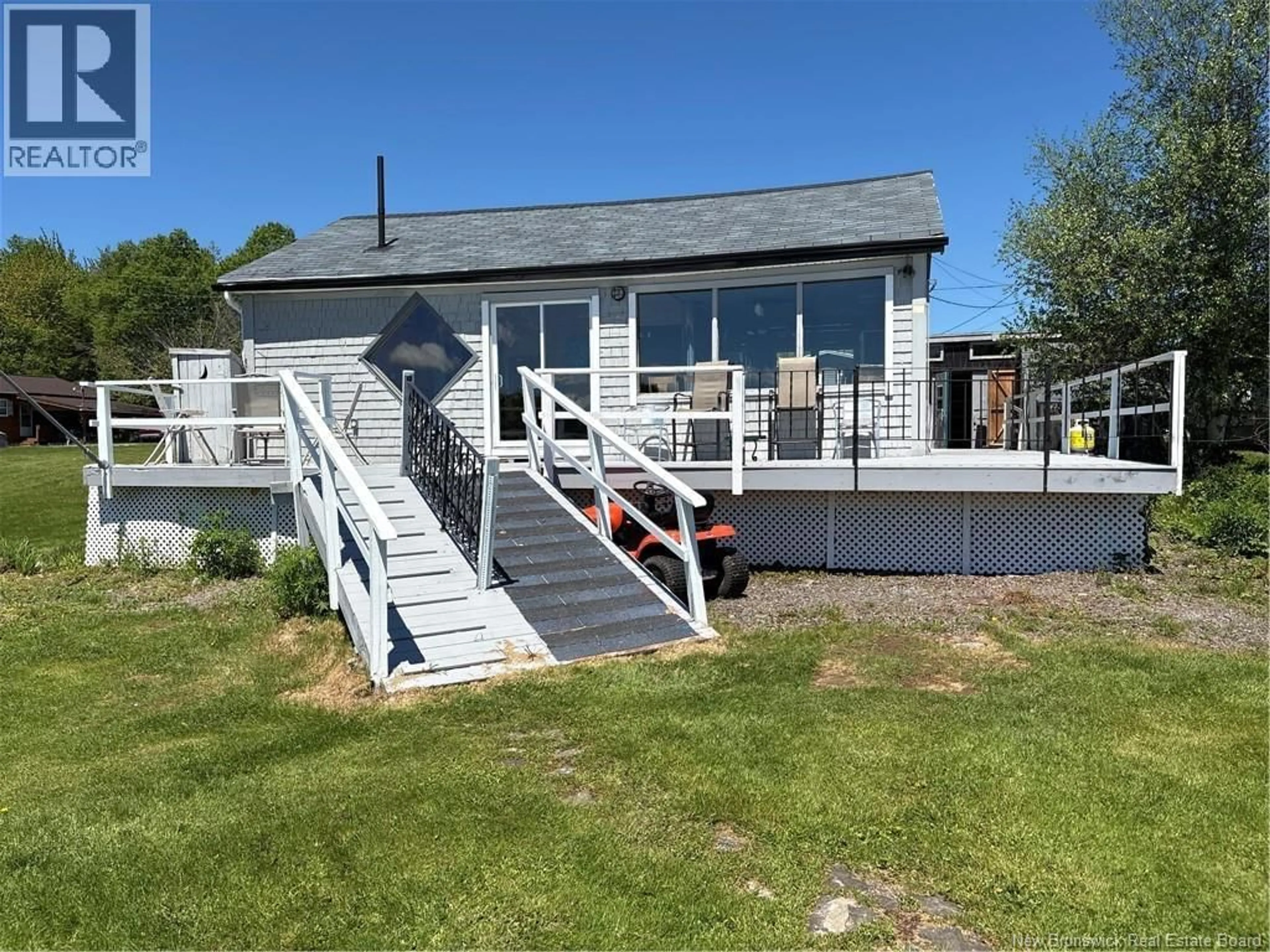 A pic from outside/outdoor area/front of a property/back of a property/a pic from drone, water/lake/river/ocean view for 119 ALBERT STREET, Notre-Dame New Brunswick E4V1S2