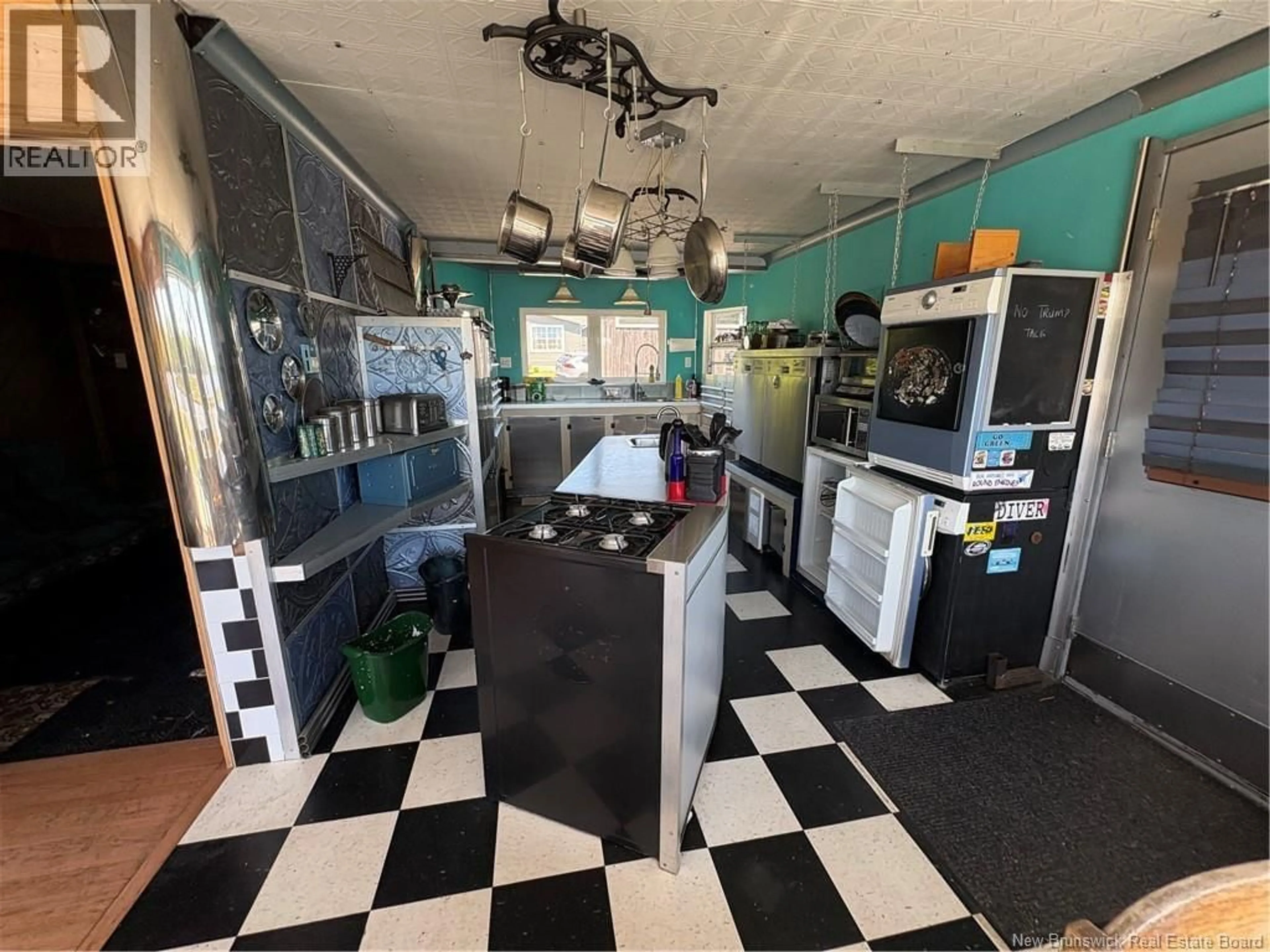 Kitchen with laundary machines, unknown for 119 ALBERT STREET, Notre-Dame New Brunswick E4V1S2