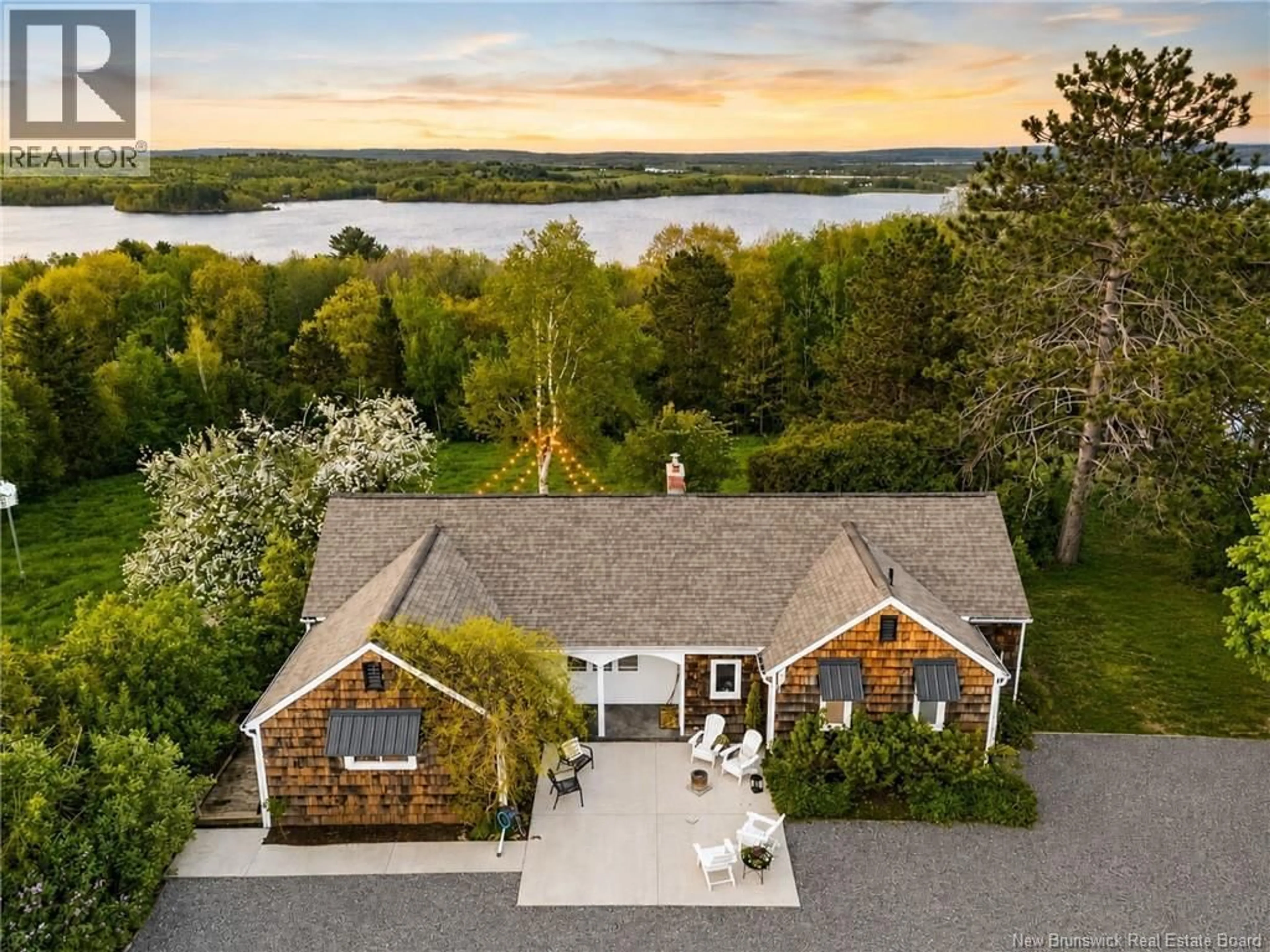 A pic from outside/outdoor area/front of a property/back of a property/a pic from drone, water/lake/river/ocean view for 4485 ROUTE 102, Queenstown New Brunswick E5M1Z5