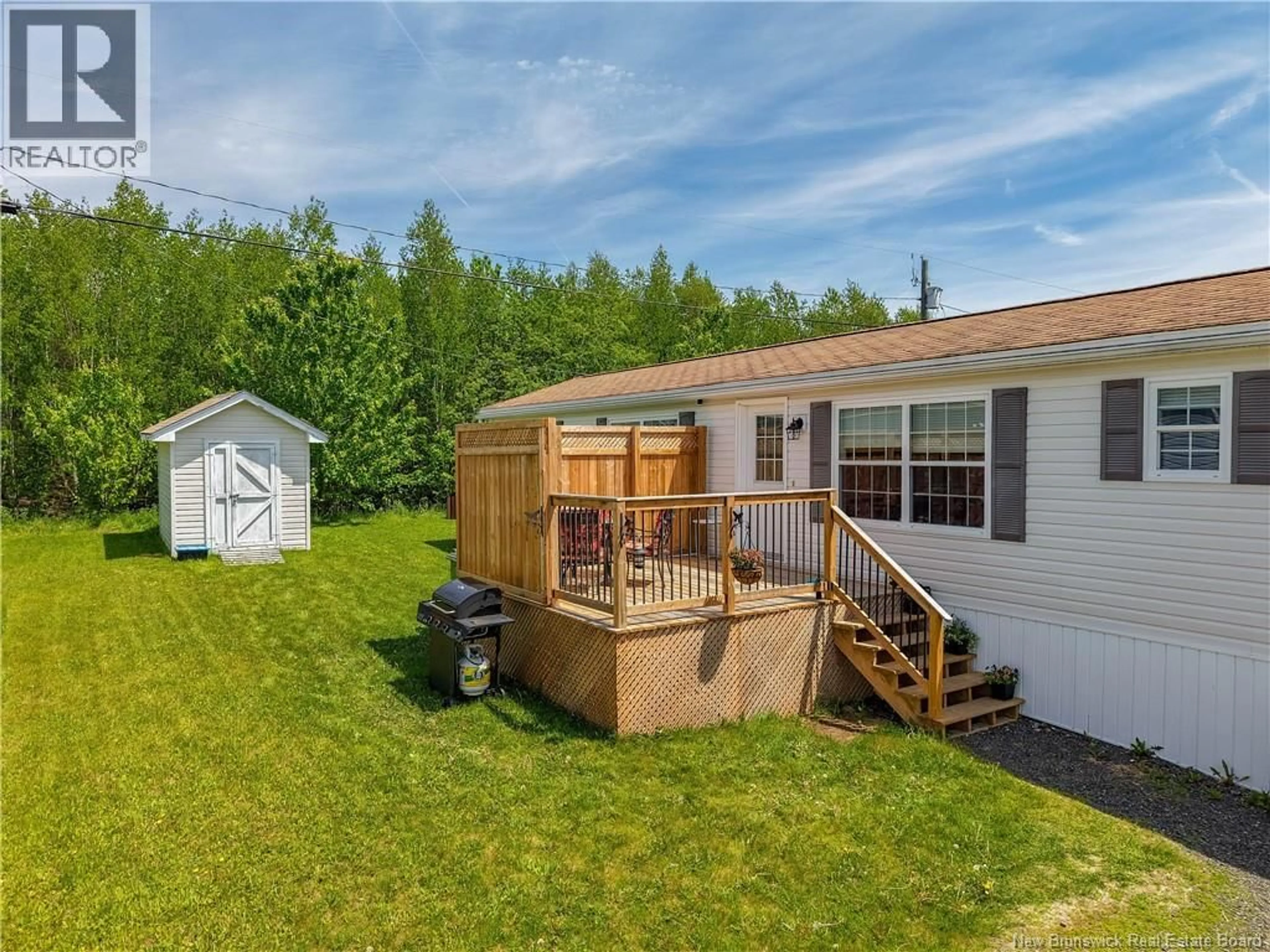 A pic from outside/outdoor area/front of a property/back of a property/a pic from drone, unknown for 185 GLENMAR DRIVE, Fredericton New Brunswick E3G0S3