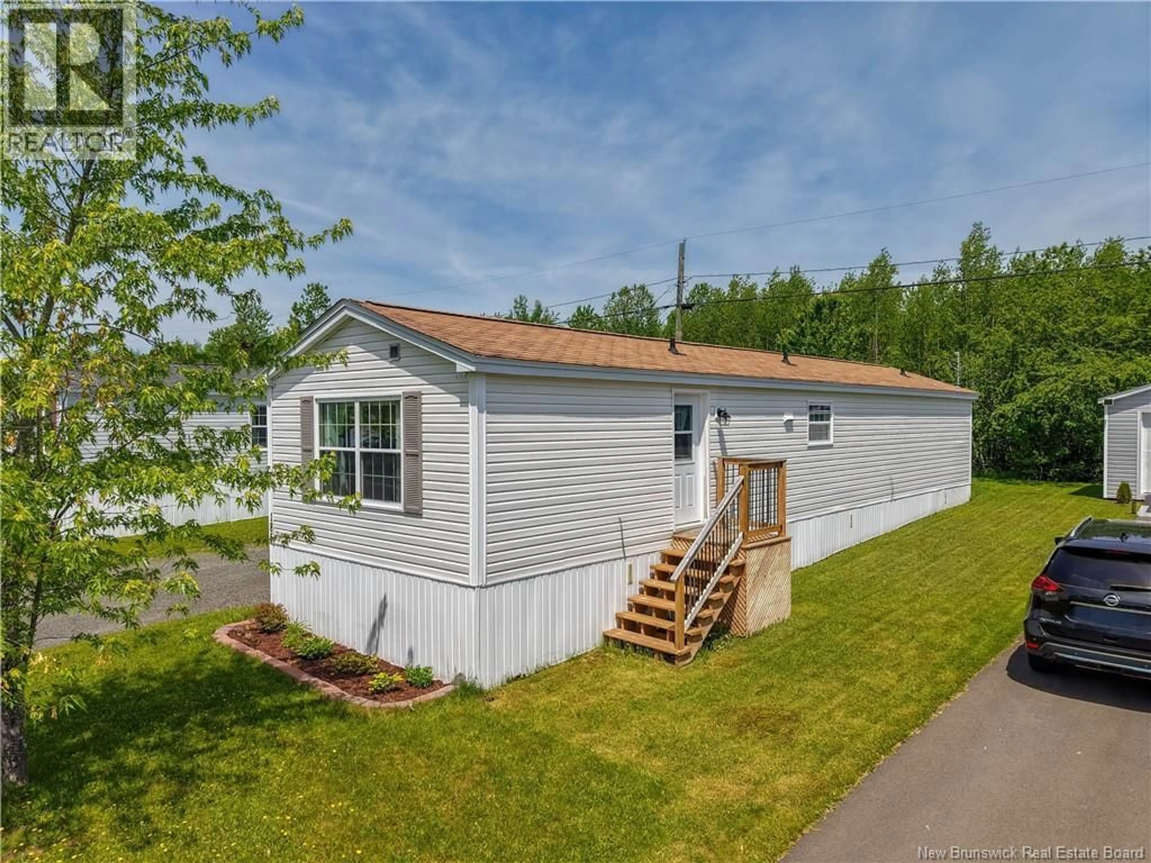 A pic from outside/outdoor area/front of a property/back of a property/a pic from drone, water/lake/river/ocean view for 185 GLENMAR DRIVE, Fredericton New Brunswick E3G0S3